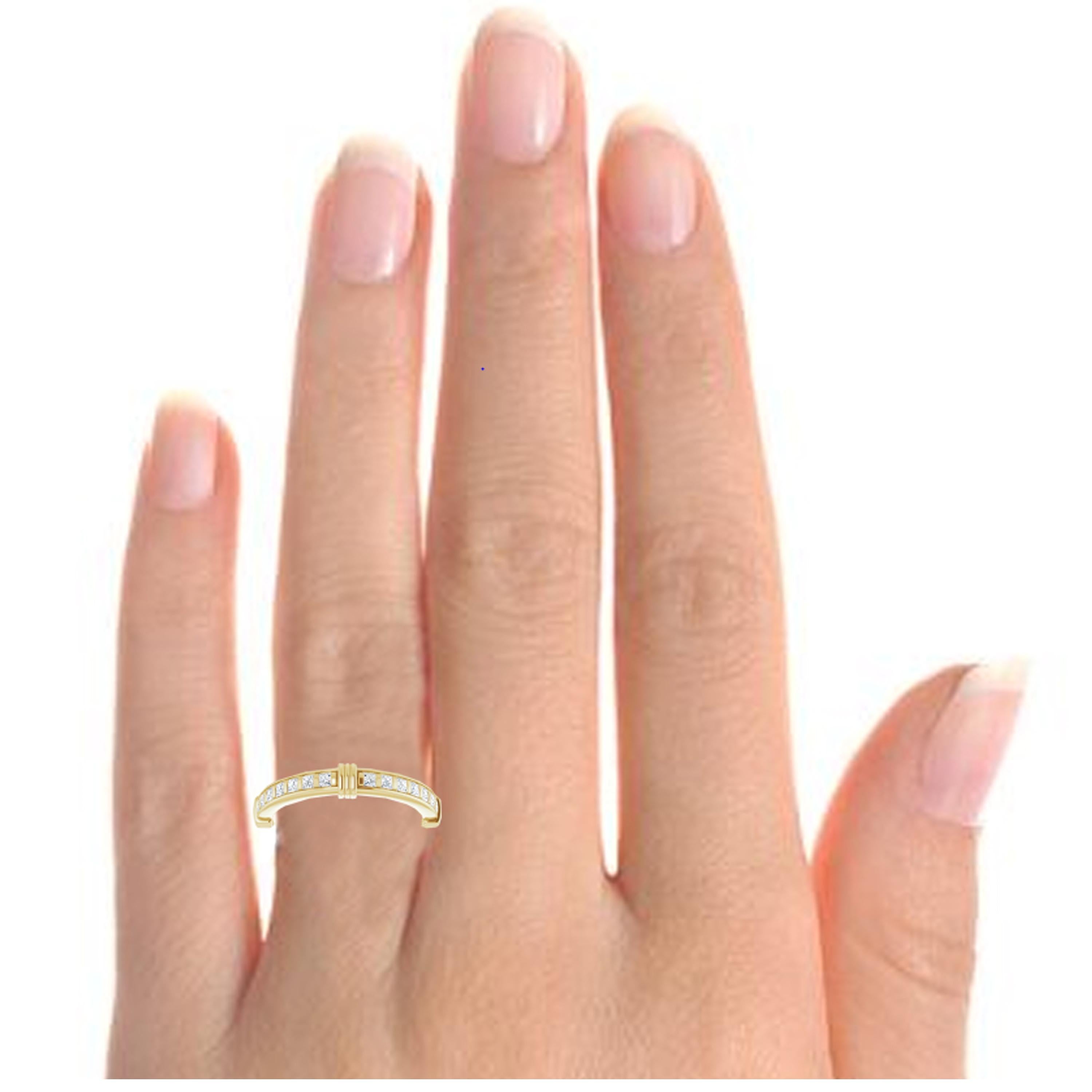 Brilliant princess cut natural diamonds float along the shank of this eternity band. Meticulously handcrafted in 18k yellow gold with a high polished finish, this wedding ring can be ordered with engraving options. Made for finger size 7, this