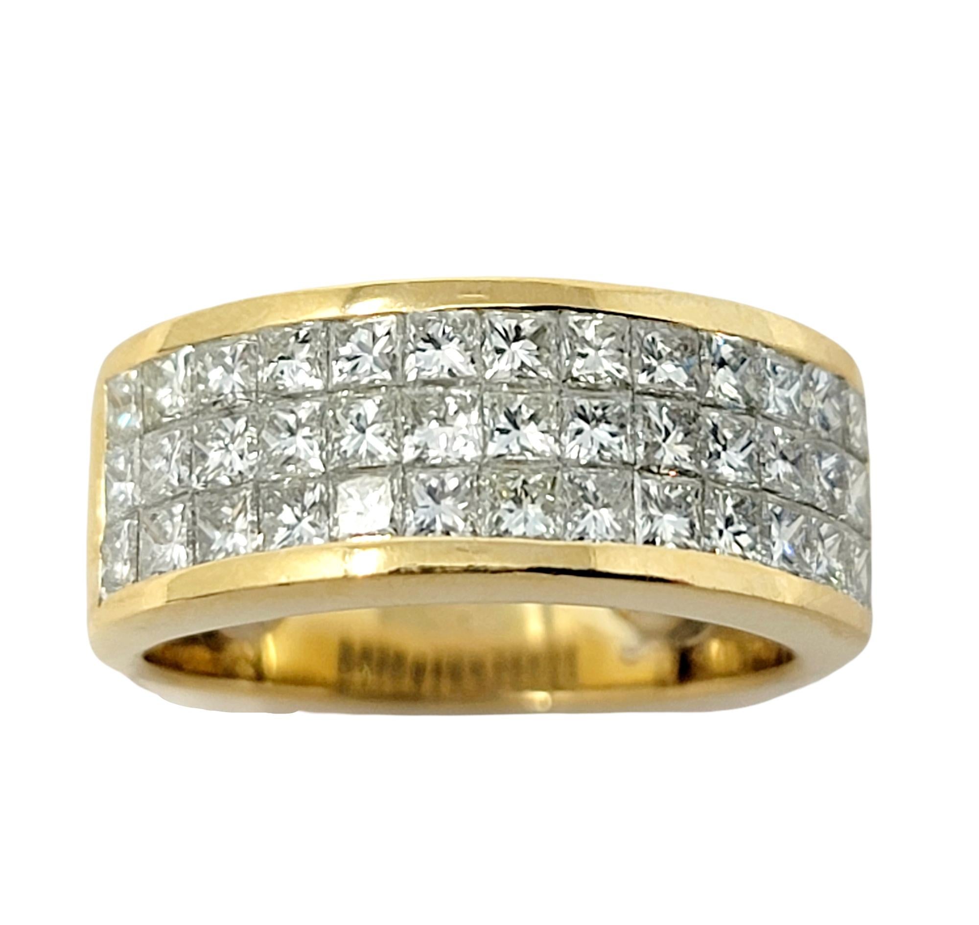 Ring size: 4.25

This dazzling diamond band ring wraps elegantly around the finger and fills it with sparkle. Featuring a sleek modern design, the invisible set natural stones catch the light from every angle, making it shimmer and shine