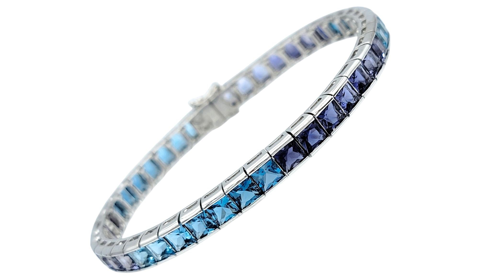 Women's Princess Cut Iolite and Blue Topaz Ombre Tennis Bracelet in 18 Karat White Gold For Sale