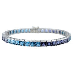 Ombre-Tennisarmband aus 18 Karat Weißgold mit Iolith im Prinzessinnenschliff und blauem Topas