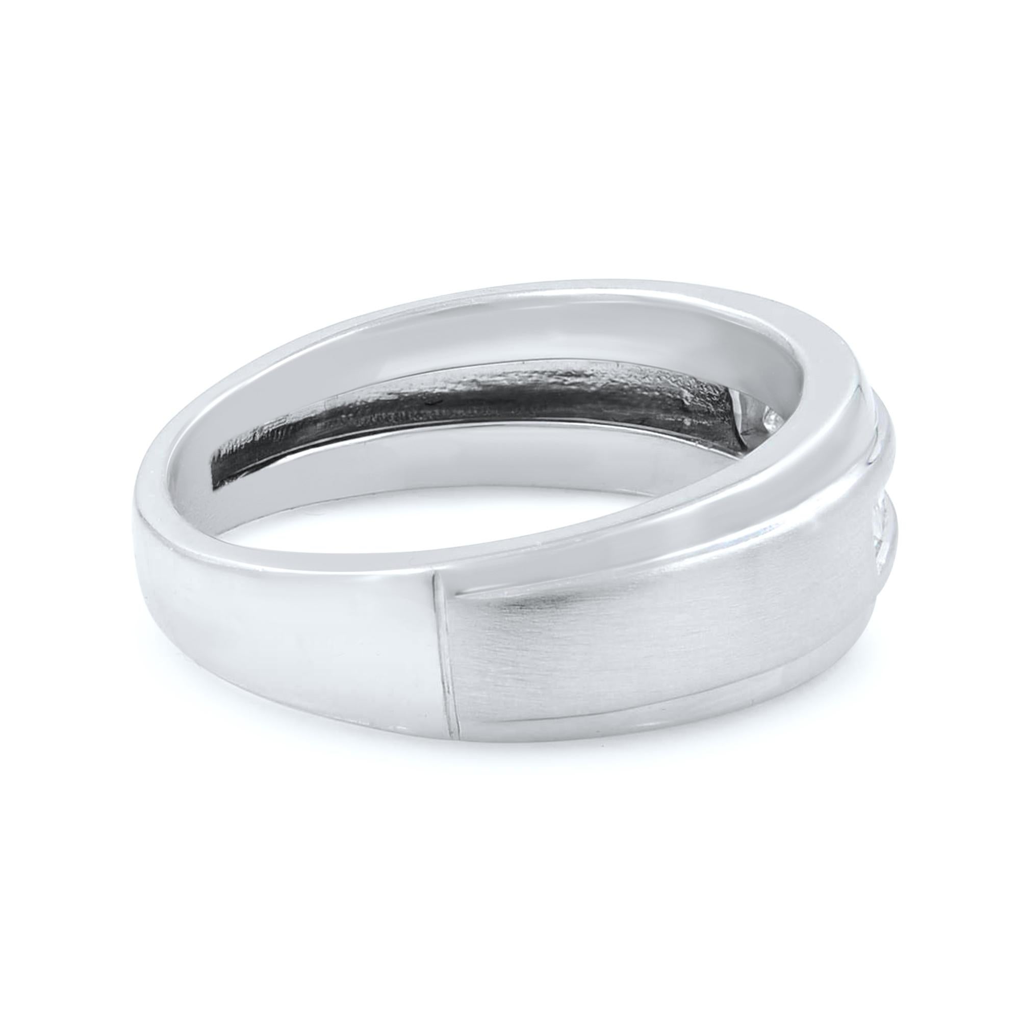 Men's diamond wedding band ring crafted in 10k white gold. The total carat weight of the ring is 0.40. The diamonds are channel set and are of H-I color and VS-SI clarity. Ring size is 10 (Can be resized). Top of the ring width: 8mm. Bottom shank