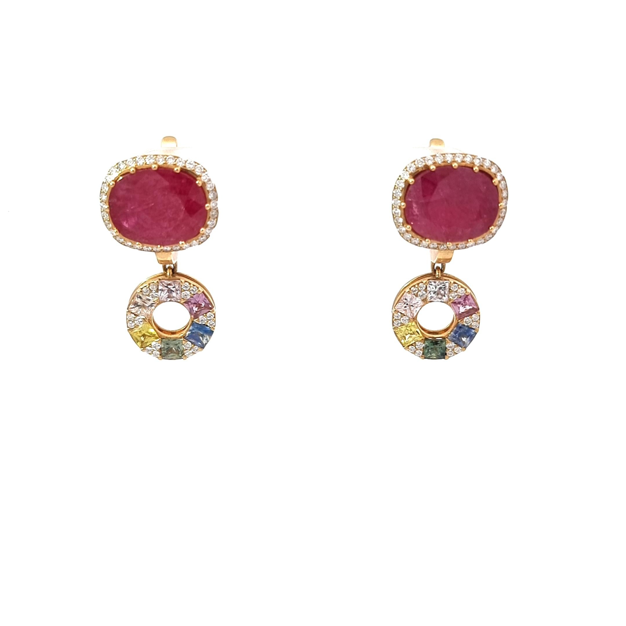 Elevate your elegance with VOTIVE Jewellery's exquisite earrings, a masterpiece of sophistication. Crafted in 18K yellow gold, these earrings showcase the allure of oval rubies, a total of 8.52 carats, symbolizing passion and allure. Accentuating