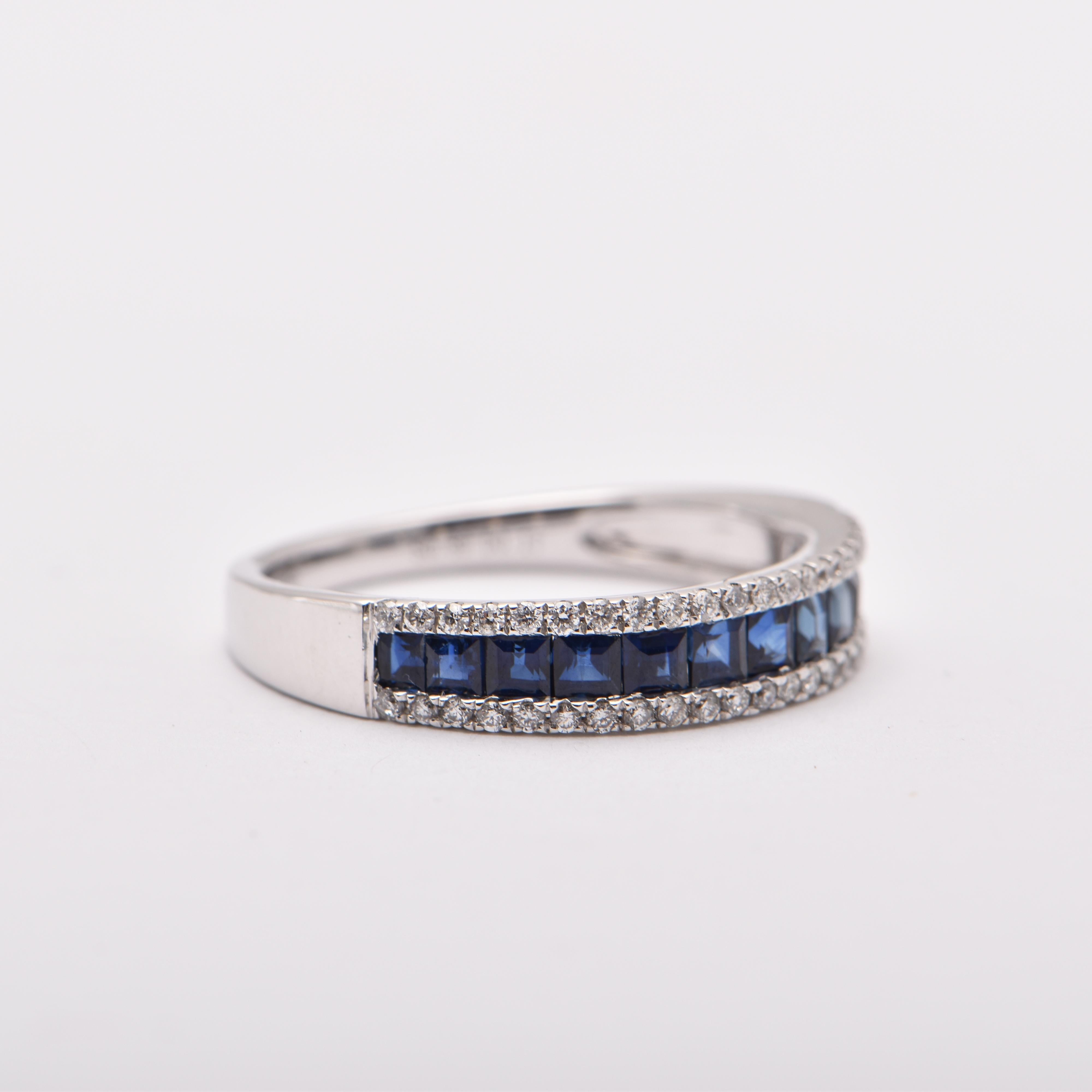 Princess Cut Sapphire and Diamond Band Ring in 18 Carat White Gold by Cartmer Jewellery

Size L-M

12 Sapphires totalling 0.89 Carats
44 Diamonds totalling 0.17 Carats
18 Carat White Gold Ring

FREE express postage usually 3-4 days Sydney to New