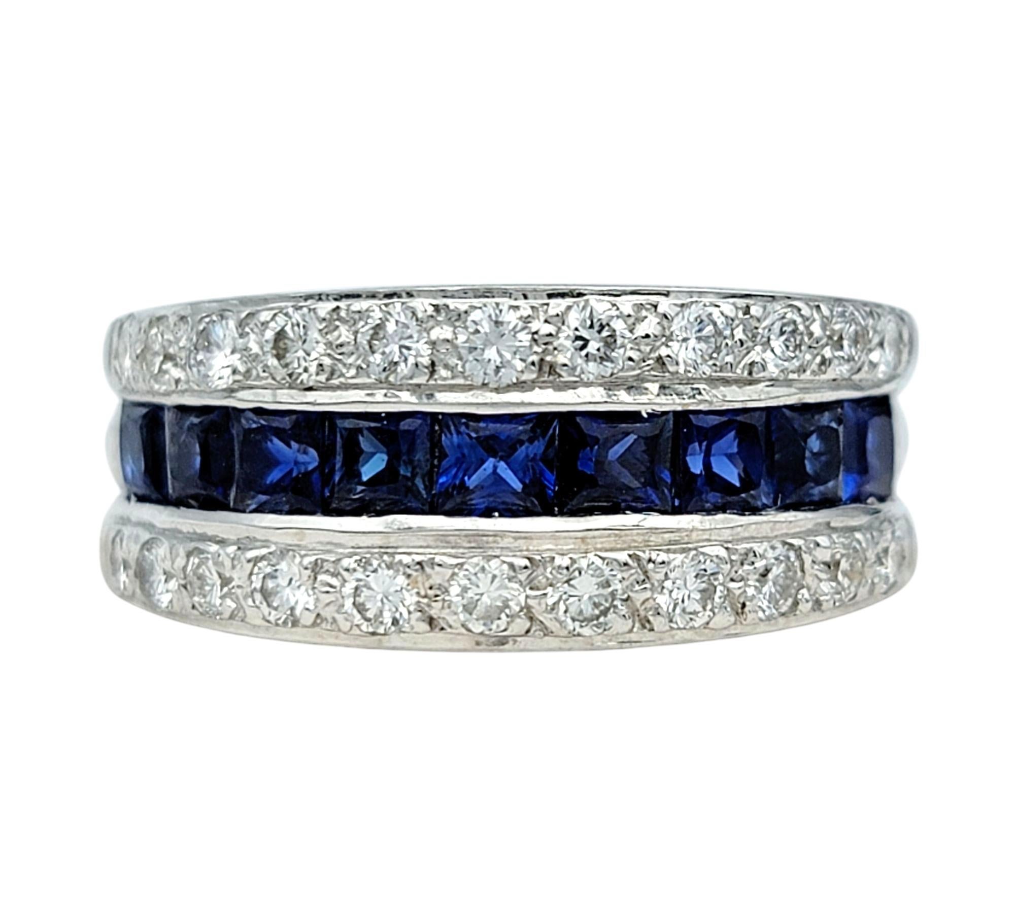 Ring Size: 7
 
Elevate your collection with this exquisite sapphire and diamond band ring, crafted in luxurious 18 karat white gold. A sleek row of channel set princess-cut blue sapphires takes center stage, radiating deep, rich hues that captivate
