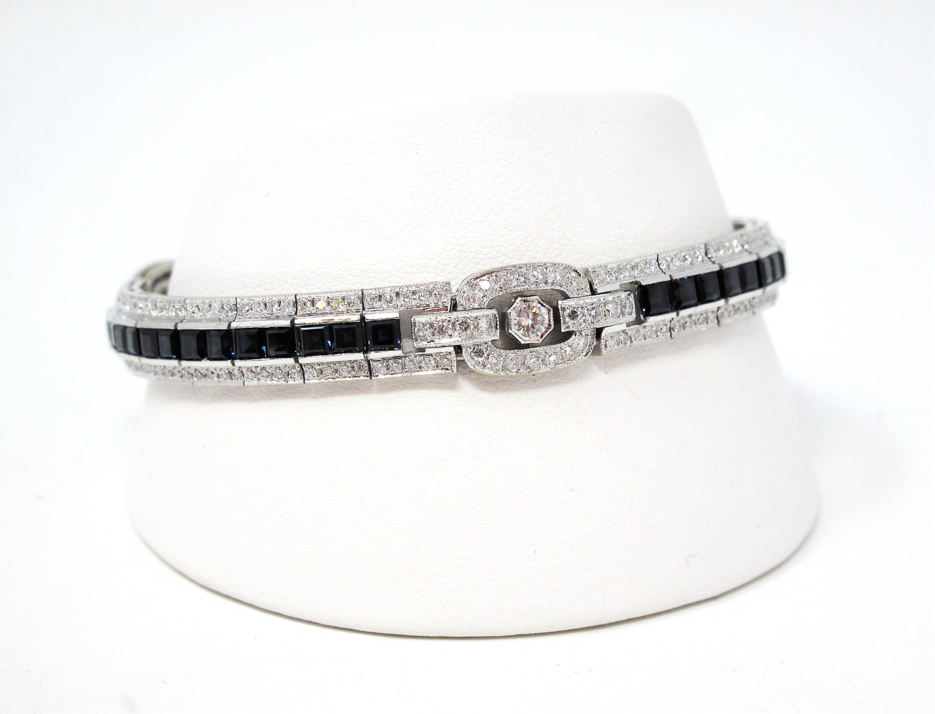 Featured here is a vintage style diamond and sapphire bracelet. This stunning piece combines the sparkle of diamonds and the rich hue of natural sapphires for an elegant, luxurious look. 

This gorgeous flexible link bracelet features 5.59 carats of