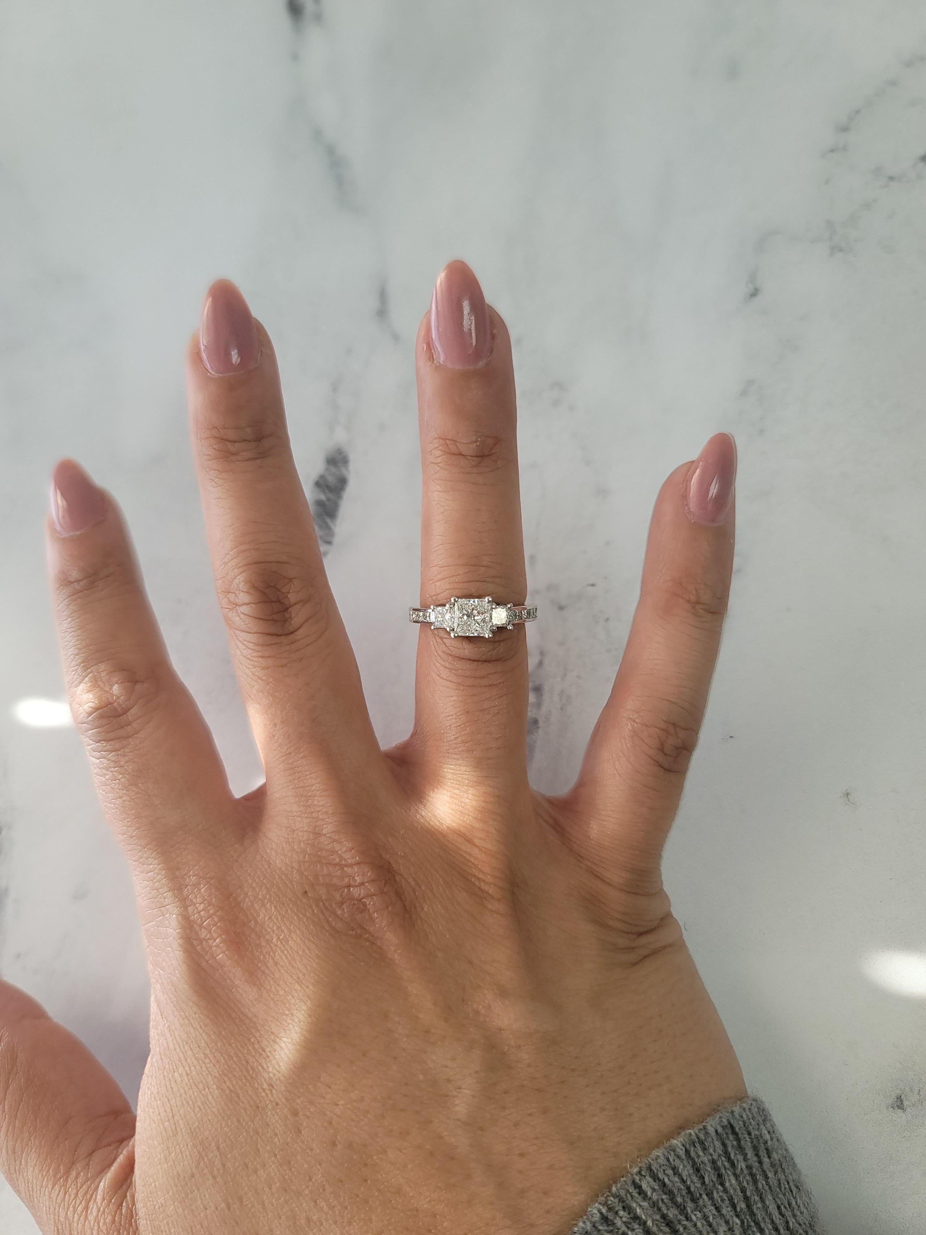 ♥ Ring Summary ♥

Main Stone: Diamond
Approx. Carat Weight: 1.31cttw
Diamond Clarity: VS2
Diamond Color: G
Band Material: 14k White Gold
Stone Cut: Princess
Width: 6mm
Weight: 4 grams
**Appraisal Included