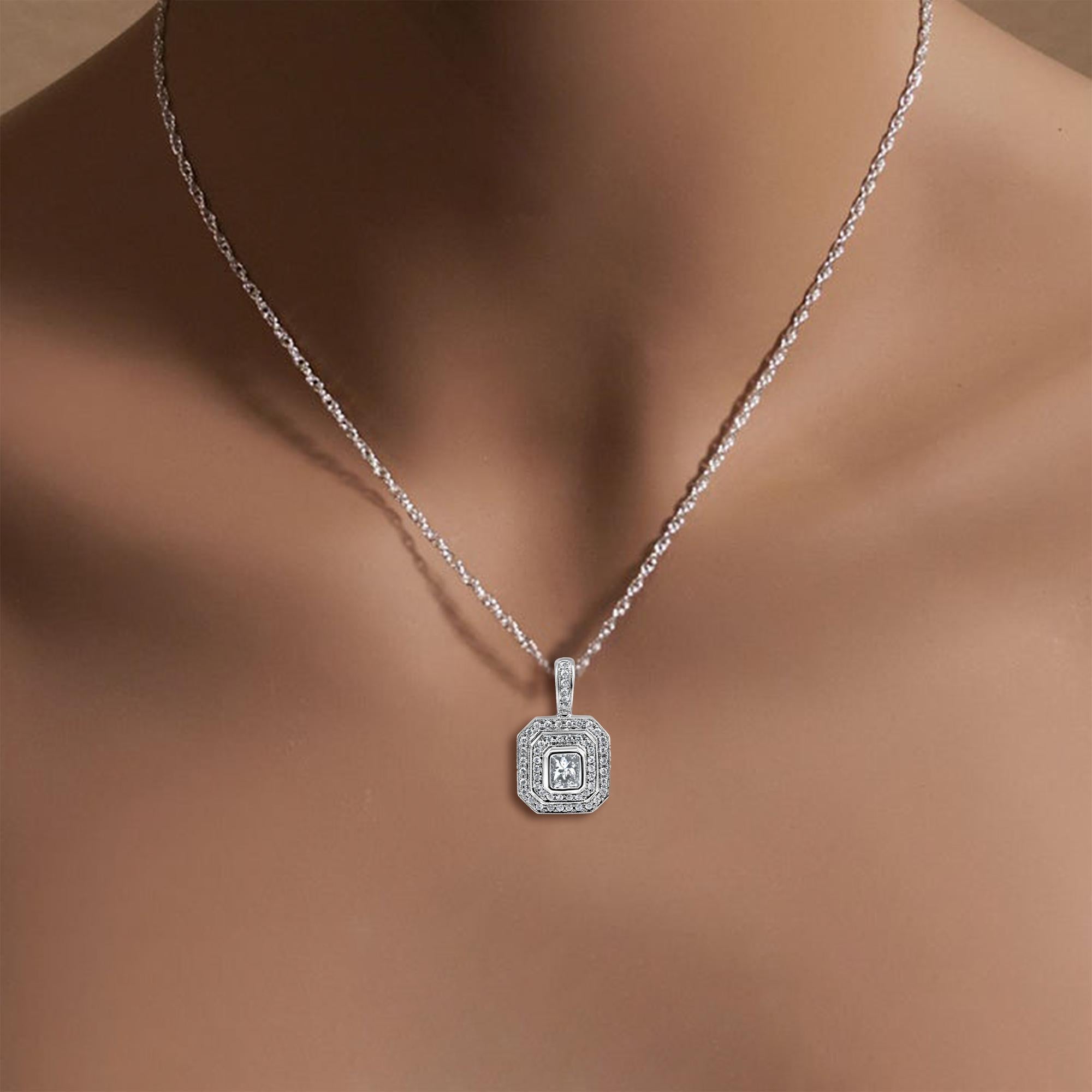 ♥ Product Summary ♥

Main Stone: Diamond 
Approx. Total Carat Weight: 1.06cttw 
Center Stone: .65ct
Accent Stones: .41ct
Stone Cut: Princess & Round
Metal Choice: 18K White Gold
Weight: 4 grams
Chain: 1.1mm Link Chain (Pendant can be sold by itself) 