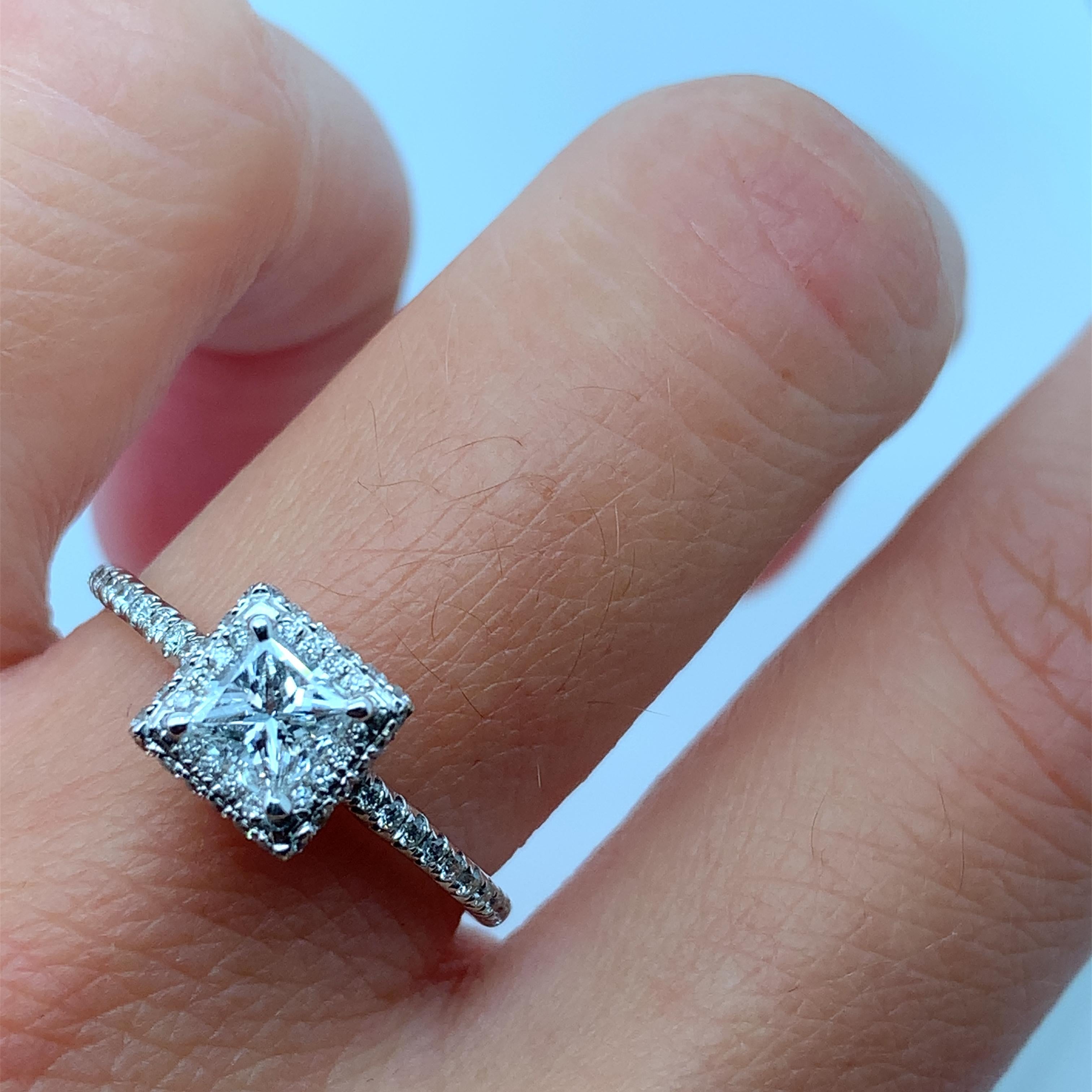 1.11ct GIA Princess Diamond Halo Engagement Ring Diamond Band 18k White Gold.
GIA CERTIFICATE D-VVS2 
Classic solitaire princess diamond engagement ring in 18ct white gold.
Chunky square diamond shape solitaire engagement ring in 18k white gold with