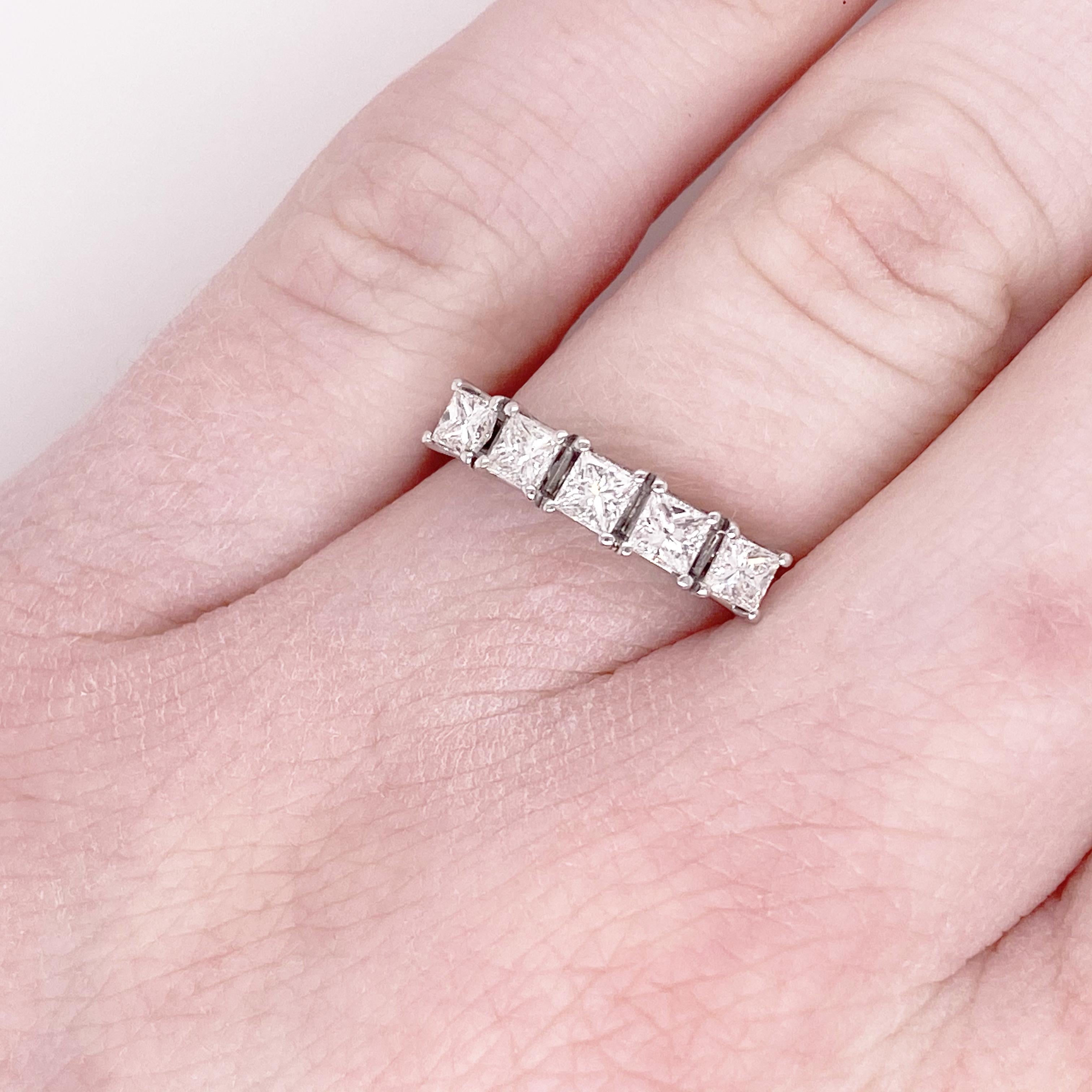 This stunning princess cut 14k white gold band dripping with diamonds is sure to take your breath away! This ring provides a look that is very modern yet classic. This ring is very fashionable and can add a touch of style to any outfit, yet it is