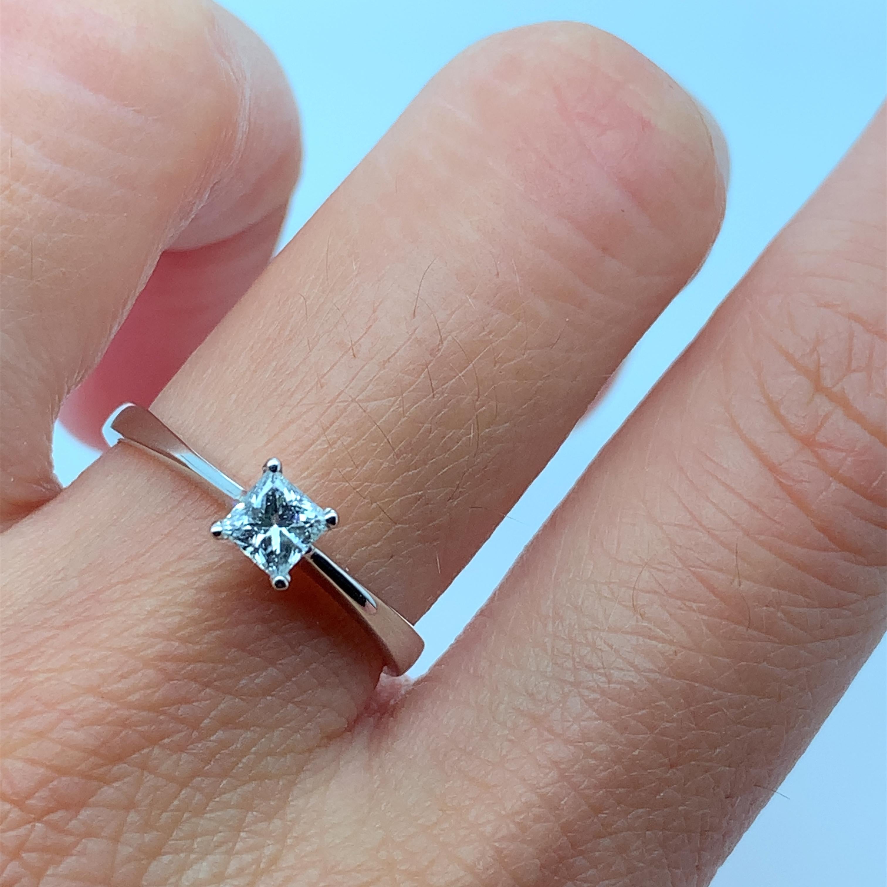 
0.35ct Princess diamond engagement ring in 18k white gold.

Lovely solitaire square cut princess diamond engagement ring in 18k white gold

Hallmarked

Diamond total weight 0.35ct F colour VVS2 clarity.
Made in London 

The ring can be resized

Box