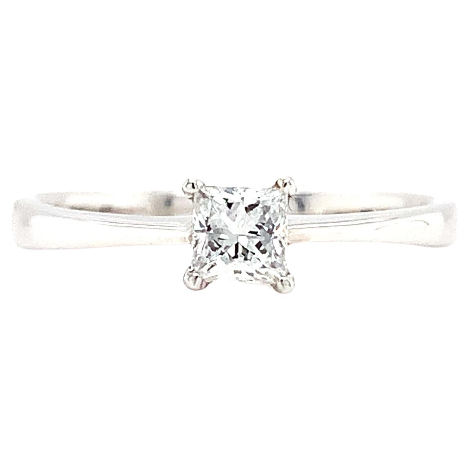 Princess diamond solitaire engagement ring 18k white gold