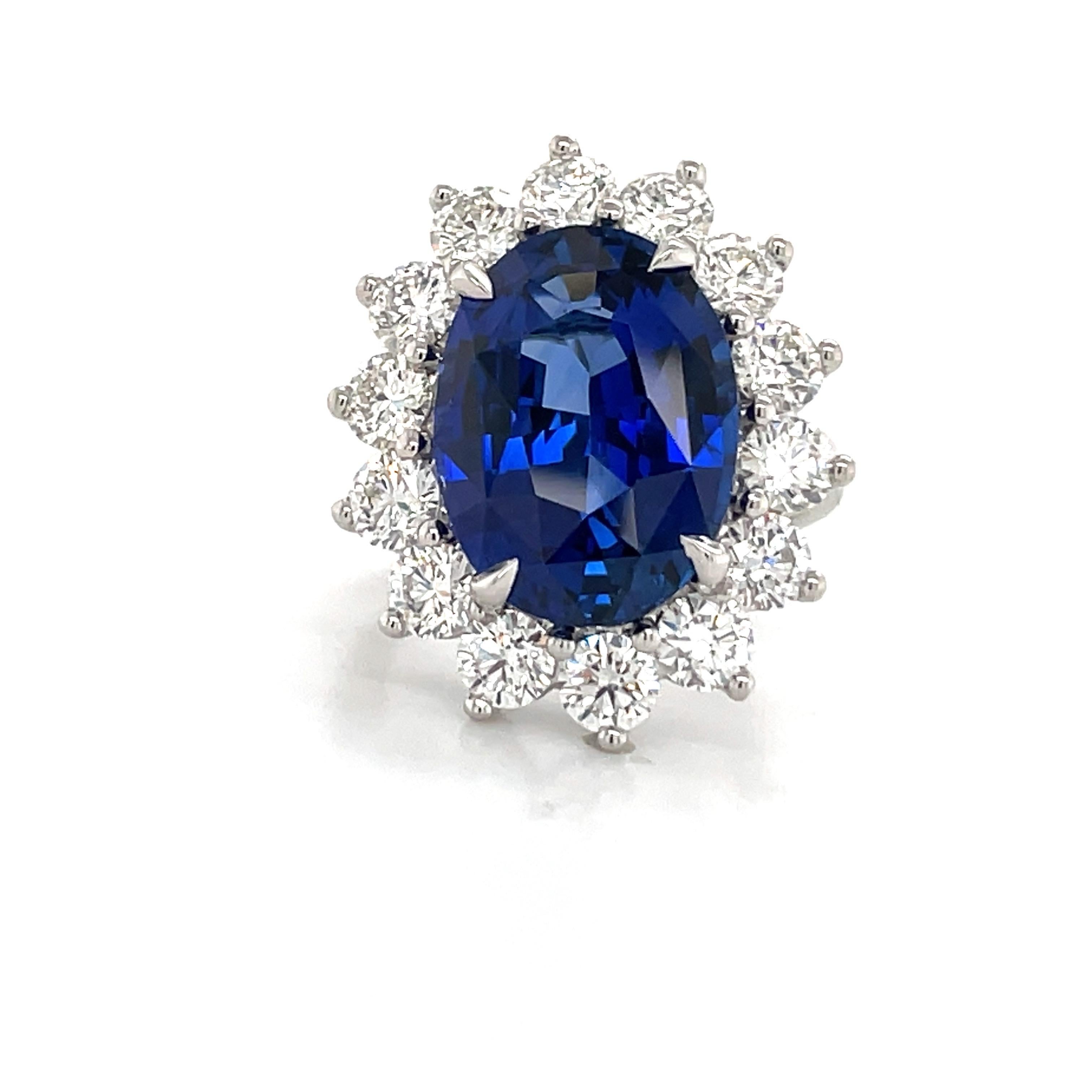 Princess Diane inspired cocktail ring featuring one GIA Certified Oval Sapphire weighing 12.06 carats flanked with 14 round brilliants weighing 3.25, crafted in Platinum.

Sapphire:
Origin: Madagascar
Measurements: 16.35 x 12.08 x 7.33 mm
Sapphire