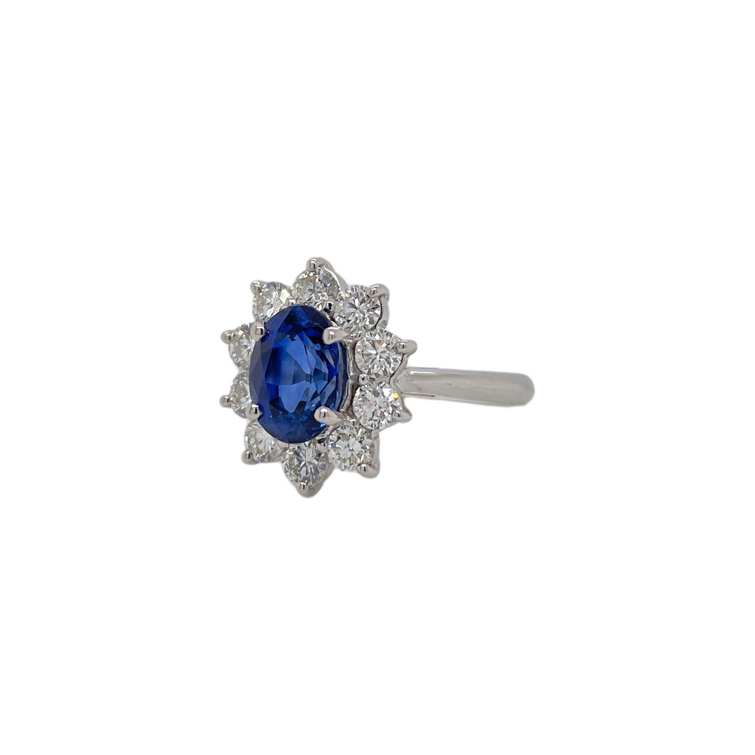 Modern Princess Diana Inspired Sapphire & Diamond Halo Ring in 18K White Gold For Sale