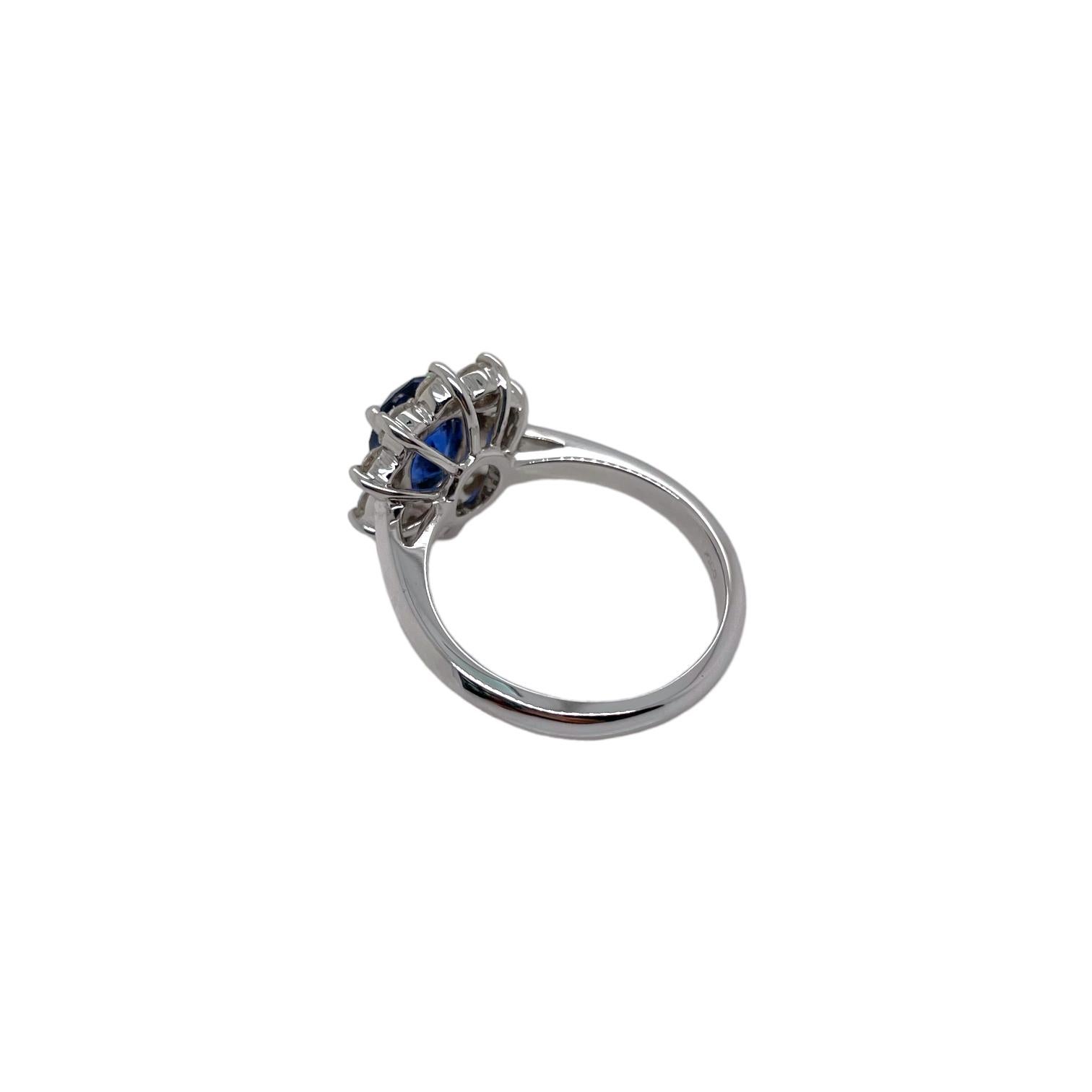 Oval Cut Princess Diana Inspired Sapphire & Diamond Halo Ring in 18K White Gold For Sale