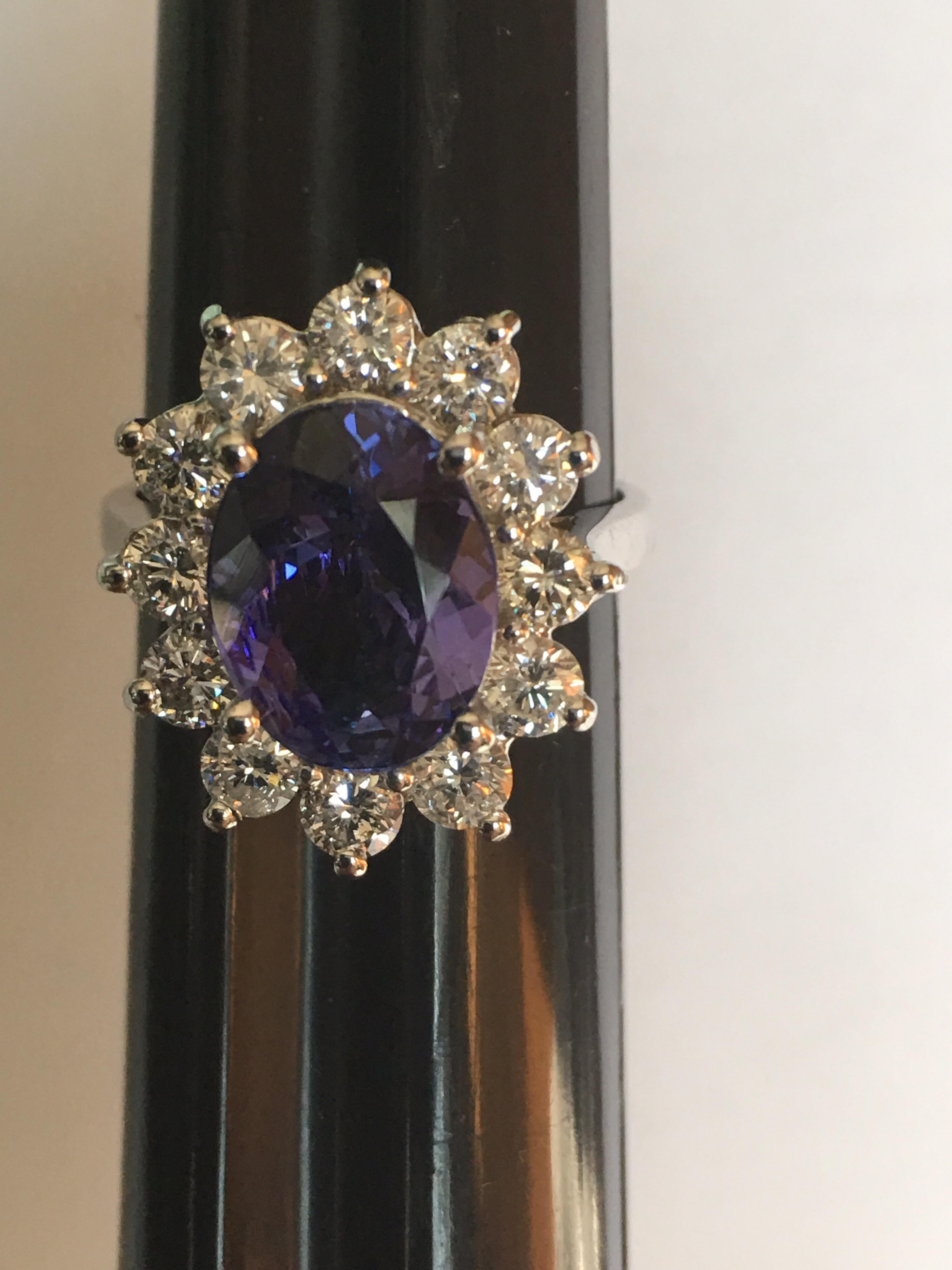 Tanzanite and  Diamonds ring is one of a kind. Size of the Tanzanite is 9mm X 11mm. Diamonds quality is VVS1 and  Color is D. The Ring is set on 14 Karat white gold. Now size of the ring is 6.5 .You can resize the ring if needed. Total weight of