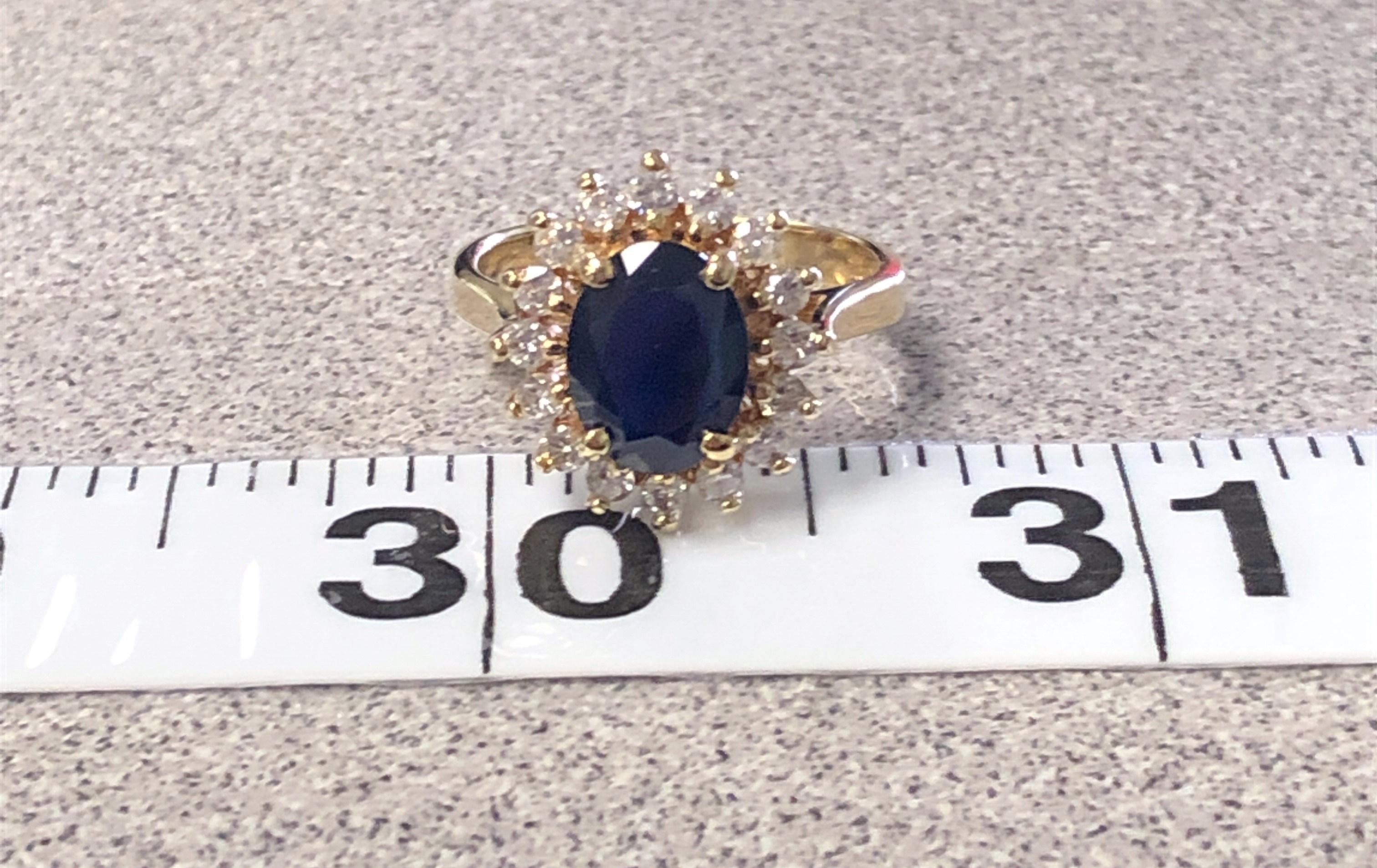 Princess Diana Style Sapphire and Diamond Halo Ring In Good Condition In Towson, MD