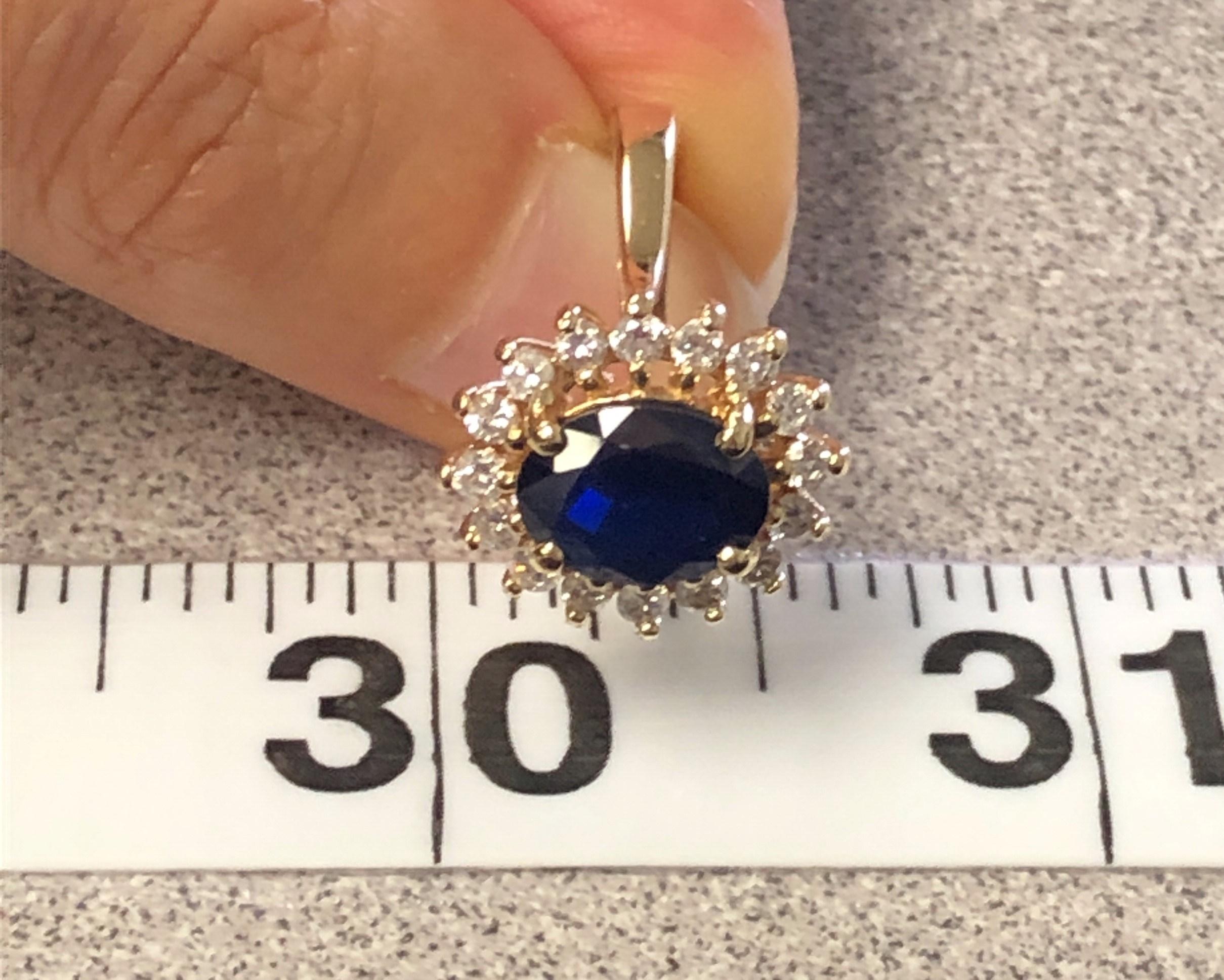 Women's or Men's Princess Diana Style Sapphire and Diamond Halo Ring