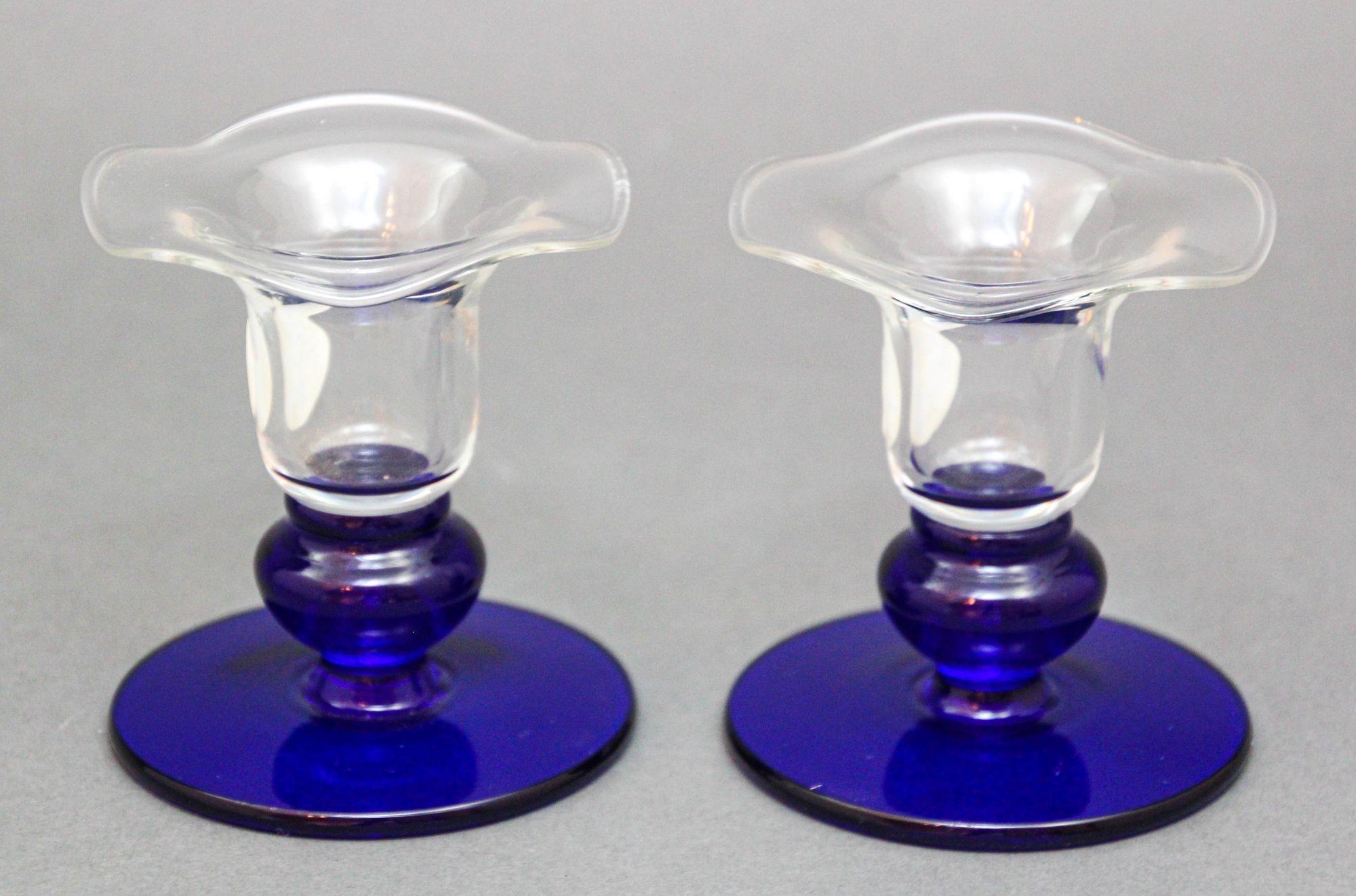 Princess House Cobalt and Clear Glass Flower Shaped Candle Holders 1980s.
Sapphire Crystal Candlestick Holders by Princess House, Flower Shaped Tops, Elegant Orb Base.
Gorgeous Vintage pair of Princess House Crystal Sapphire blue taper Candlestick