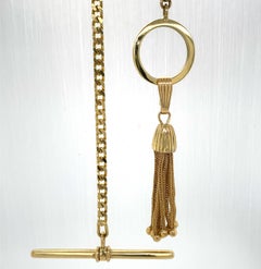 Princess Length Curb Chain with Toggle Closure & Tassel Ornament in Yellow Gold