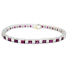 Princess Ruby and Baguette Diamond Tennis Bracelet in 18 Karat White Gold