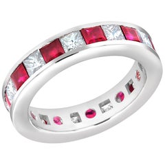 Princess Ruby Princess Diamond Eternity 18 Karat Gold Ring Weighing 4.80 Carat