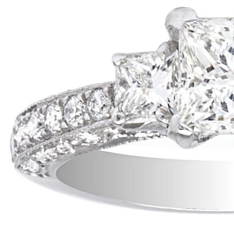 three stone princess cut engagement ring with wedding band