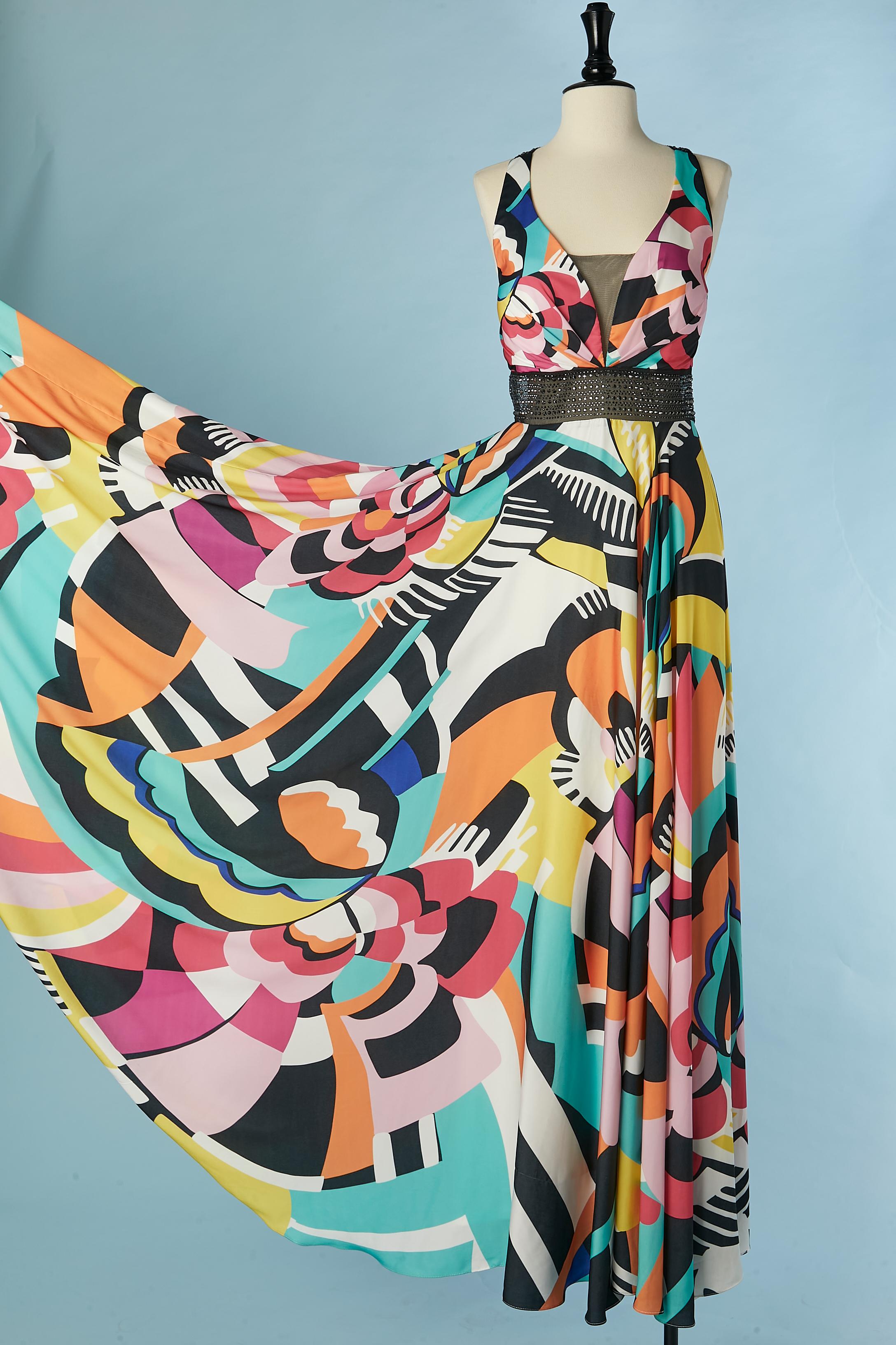 Printed backless evening dress with rhinestone embellishment . Fabric composition: 95% polyester, 5% lycra . 
Padded bra. Hook&eye and zip closure on the middle back. 
SIZE 42/ L 