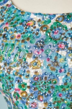 Printed cocktail dress with sequin allover Circa 1960's