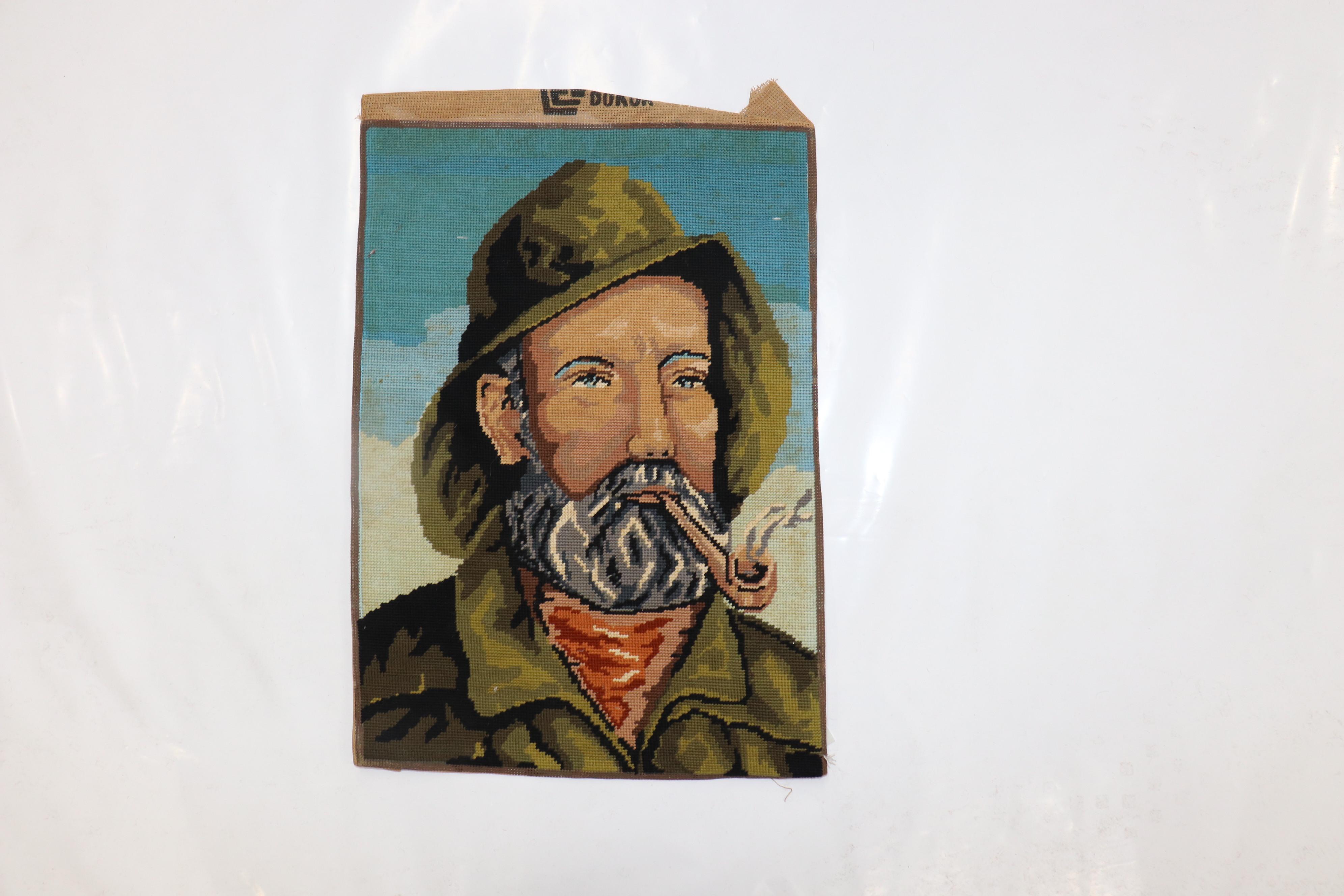 Folk Art Printed Israeli Needlepoint with Man Smoking Cigar For Sale