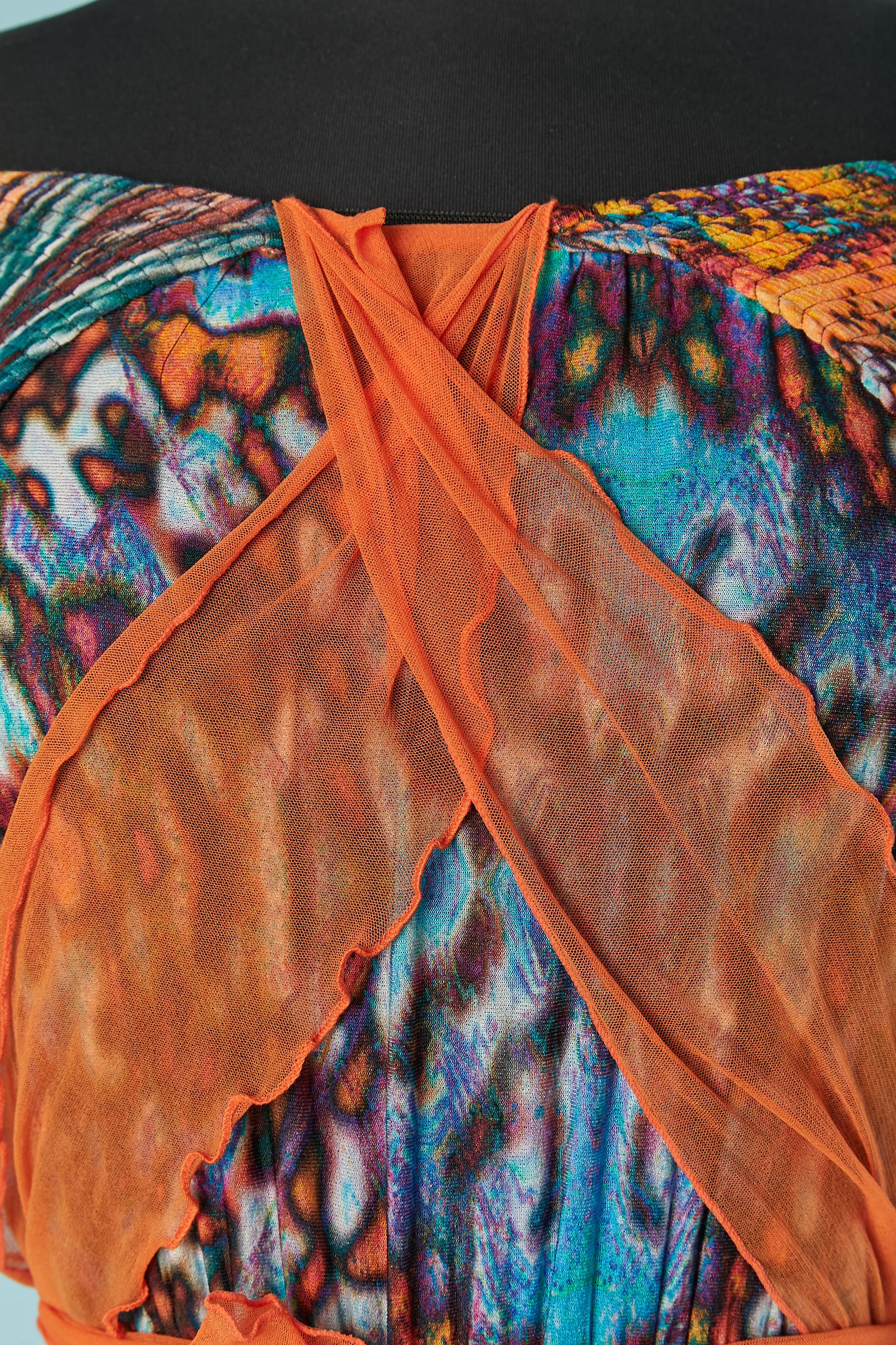 Printed jersey jumpsuit . Main fabric composition: 92% rayon, 8% elasthane. NO BRAND TAG ( just visible on the fabric composition tag) 
Smocks on the collar. Pocket on both side. 
The scarf cant be wear in differents ways ( also around the neck for