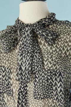 Printed shirt and pleated skirt ensemble in branded silk chiffon Louis Vuitton