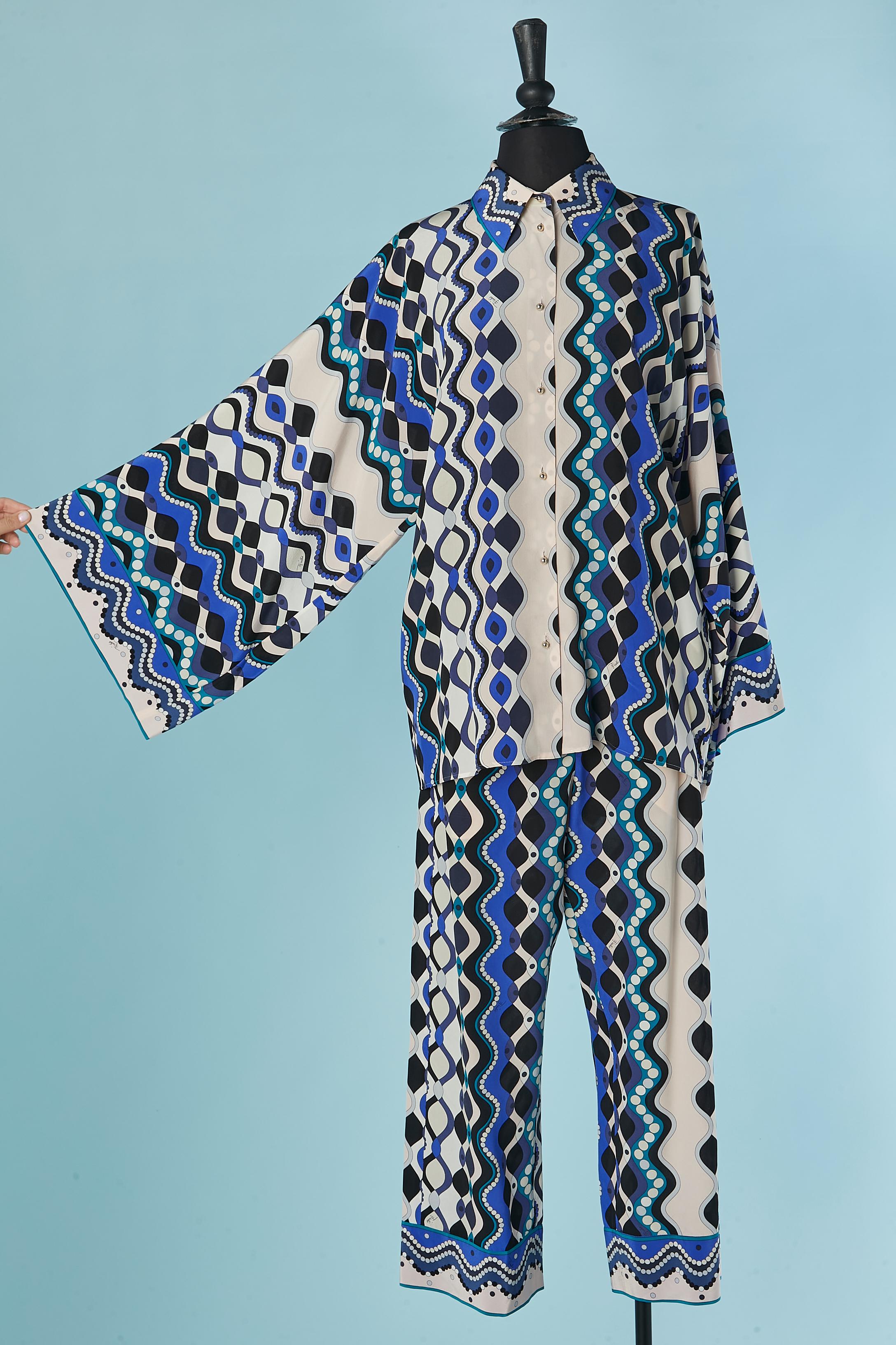 Printed shirt with wide kimono sleeve and trouser printed ensemble. Gold metal button and buttonhole closure on the middle front. 
SIZE L 