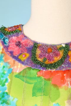 Printed silk cocktail dress with beaded neckless and cuff Bill Blass