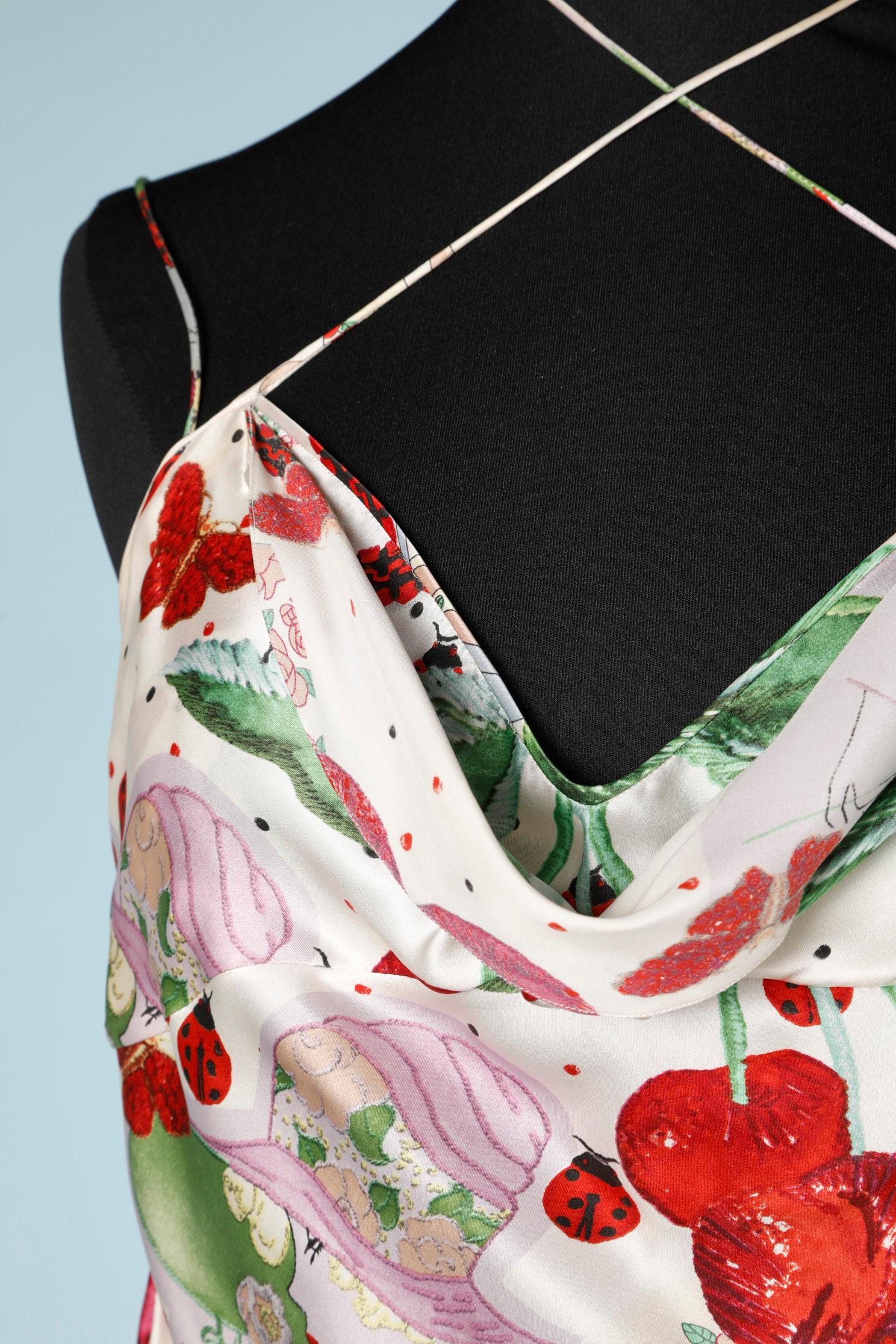 Printed silk  top with spaghettis straps and a silk bow on the side in the same fabric 