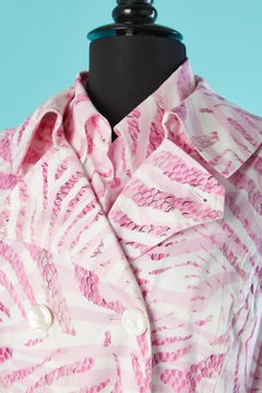 Printed sleeveless trench-coat and double-shirt ensemble Escada