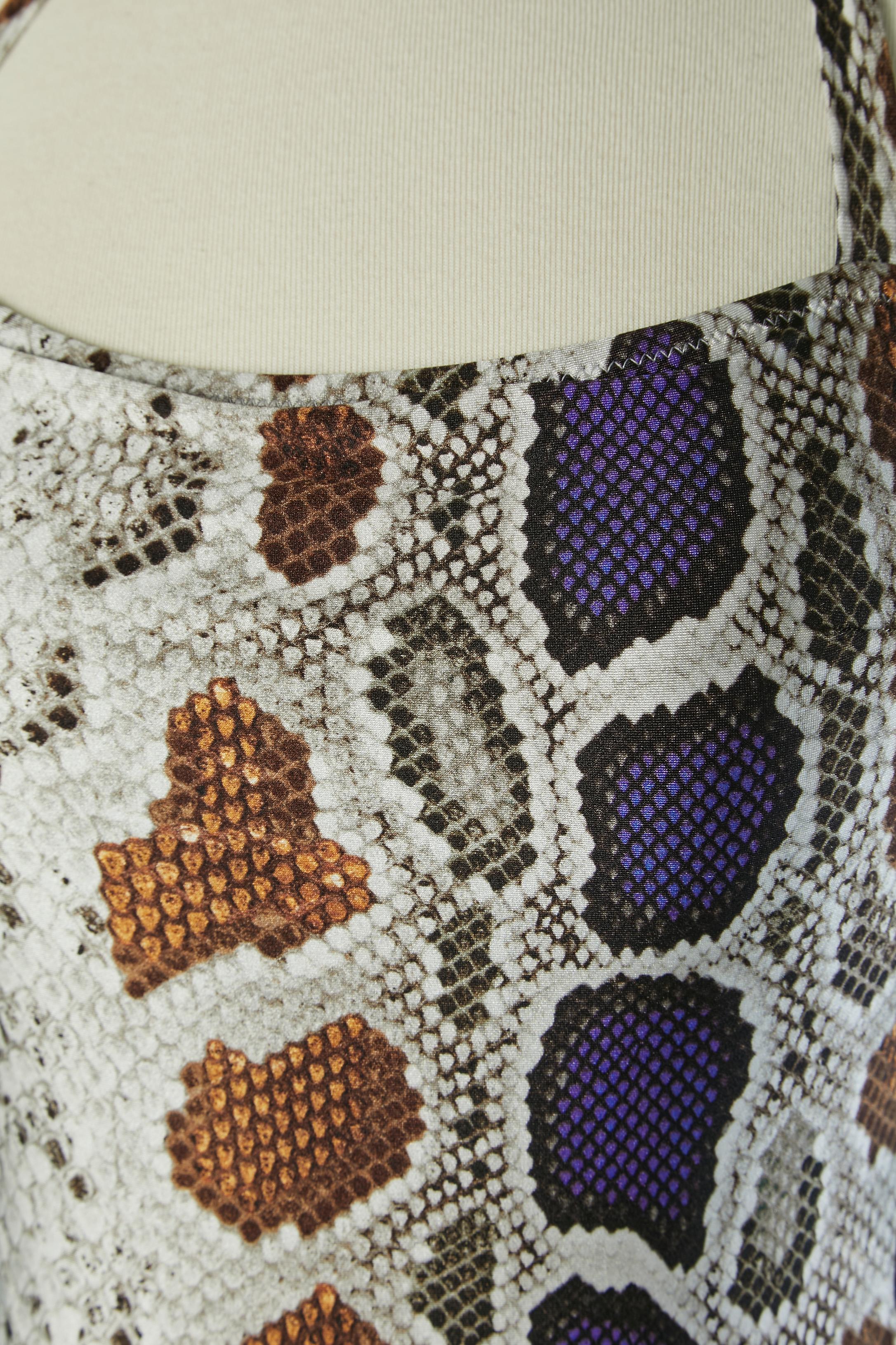 Bedruckte Bademode . Zusammensetzung des Stoffes: 80% Nylon, 20% Elastan 
Echtheitshologramm. Entbeint auf der Seite der Büste. 
SIZE III auf Anhänger / M 