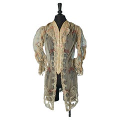 Printed tulle jacket with ribbon, flowers and threads embroideries Circa 1890