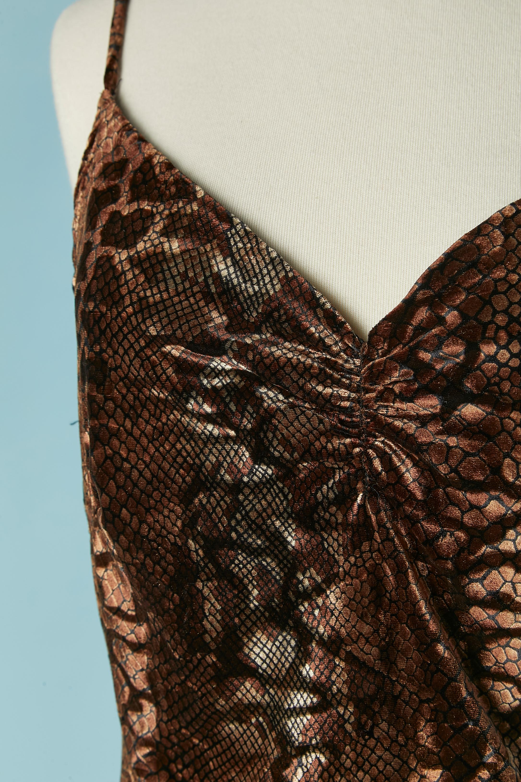 Printed stretch velvet slip dress . Black polyester lining only inside the bust on the front. Gather on the middle front. 
Split on the left side, lenght= 34cm
SIZE M 