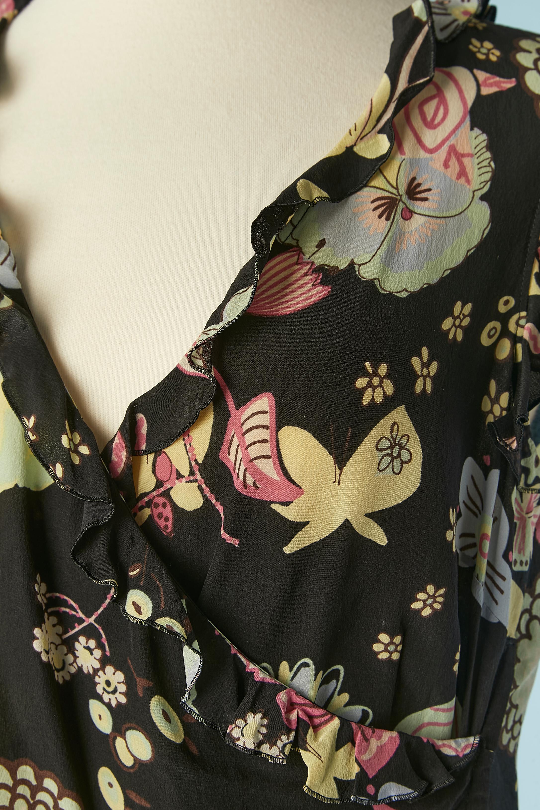 Printed wrapped top and skirt with lace edge. Main fabric : silk chiffon. Snap closure for the top on the left side. 
Top's size : 40 (It) 36 (Fr) S 
Skirt's size : 42 (It) 38 (Fr) 8 (Us) M 