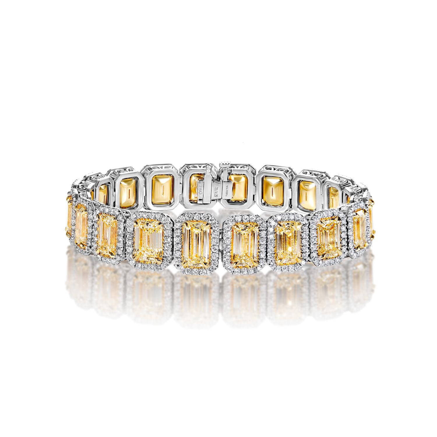 The PRISCILLA 35.99 Carat Single Row Diamond Tennis Bracelet features EMERALD CUT DIAMONDS brilliants weighing a total of approximately 35.99 carats, set in 18K White Gold.

Style:
Diamonds
Diamond Size: 31.70 Carats
Color: Yellow
Diamond Shape: