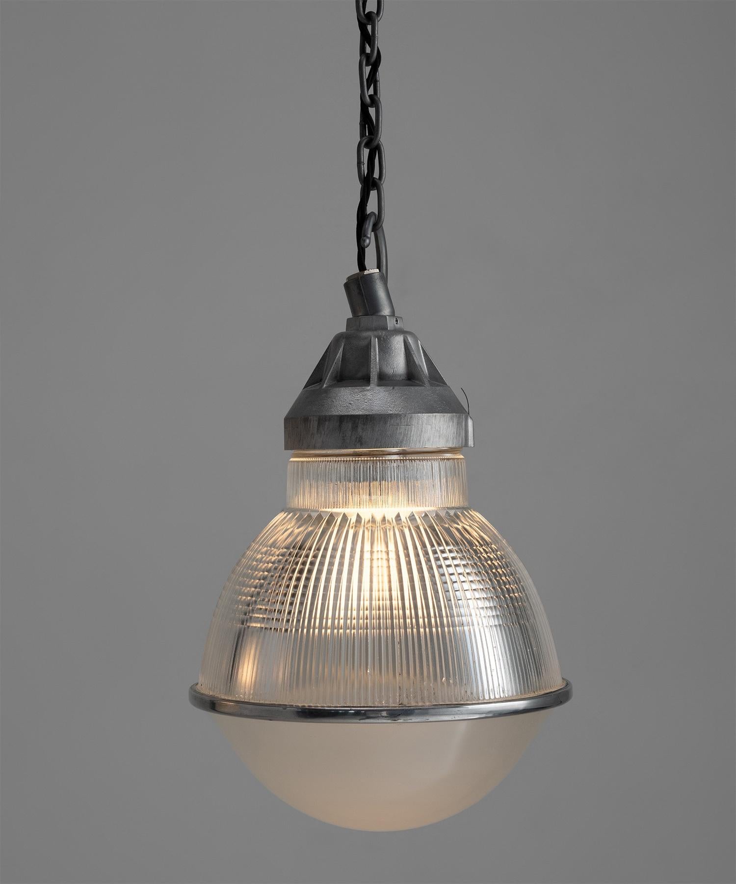 Prismatic domed holophane pendant

France, Circa 1950

Prismatic upper shade with frosted lower shade and cast metal hardware.

Measures: 10.5”diameter x 15”height (fixture)

*Please note the price is per unit, and the lights are sold