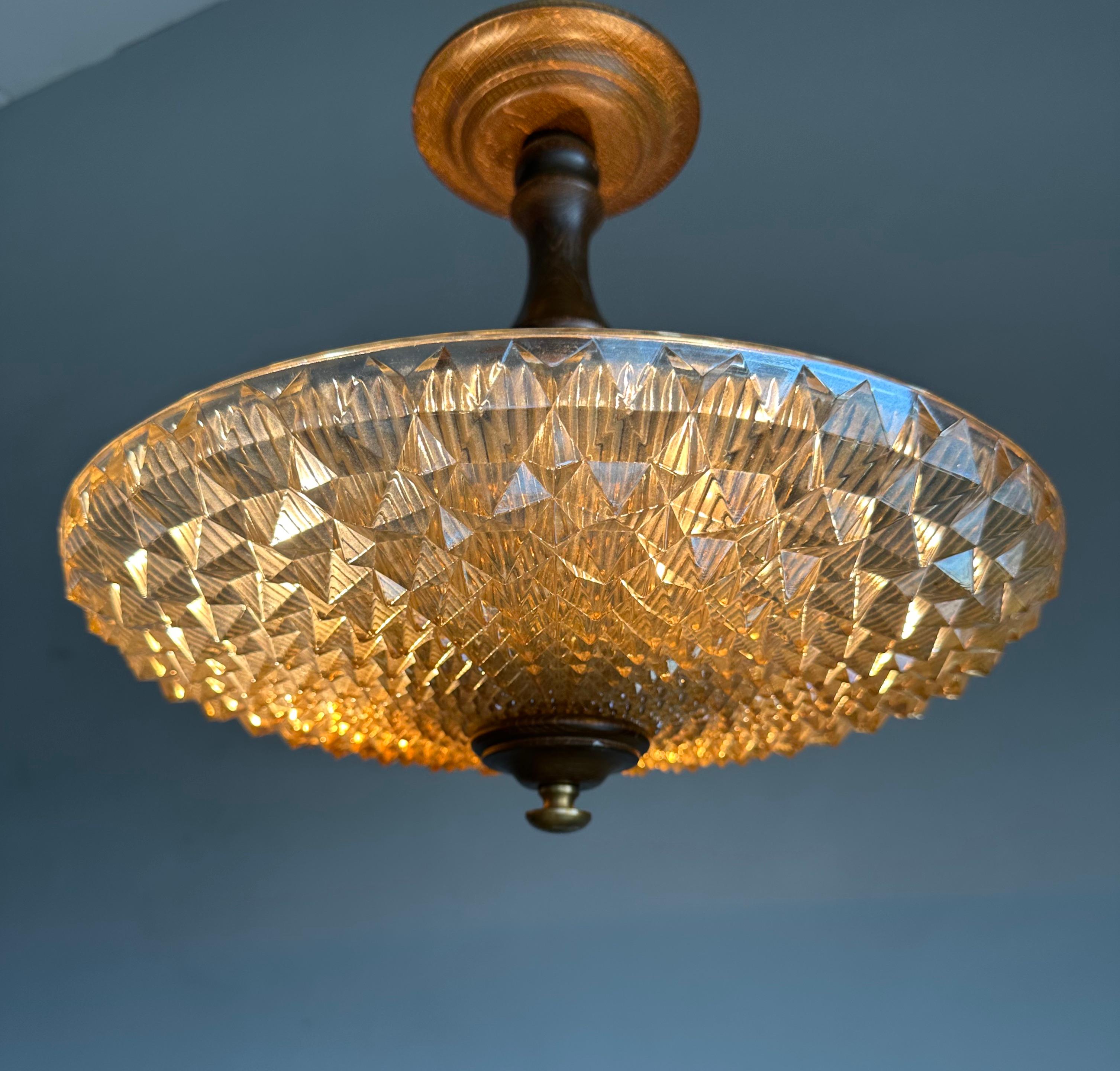 Stunning Art Deco style 3-light fixture / flushmount

In our view this rare and amazing design pendant is one of the few French designs that comes very close to the geometry of American Art Deco designs from the 1920s and 1930s. The combination of