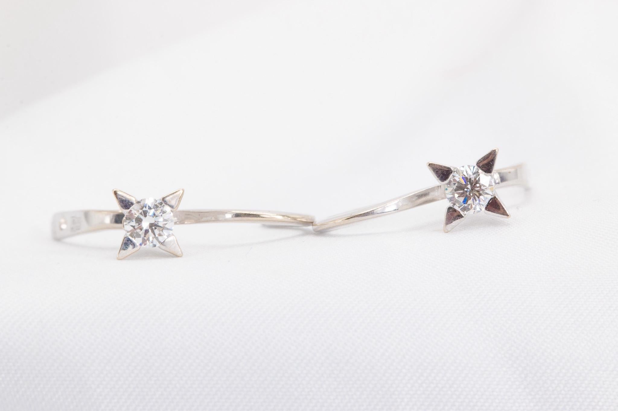 Pristine 0.50 Carat Total Weight Starry Drop Earrings in 14K White Gold

Weighing 3.5 grams of 14K white gold and featuring two 0.25ct round brilliant cut diamonds, these drop earrings utilize a hinged leverback closure for utmost ease and comfort.