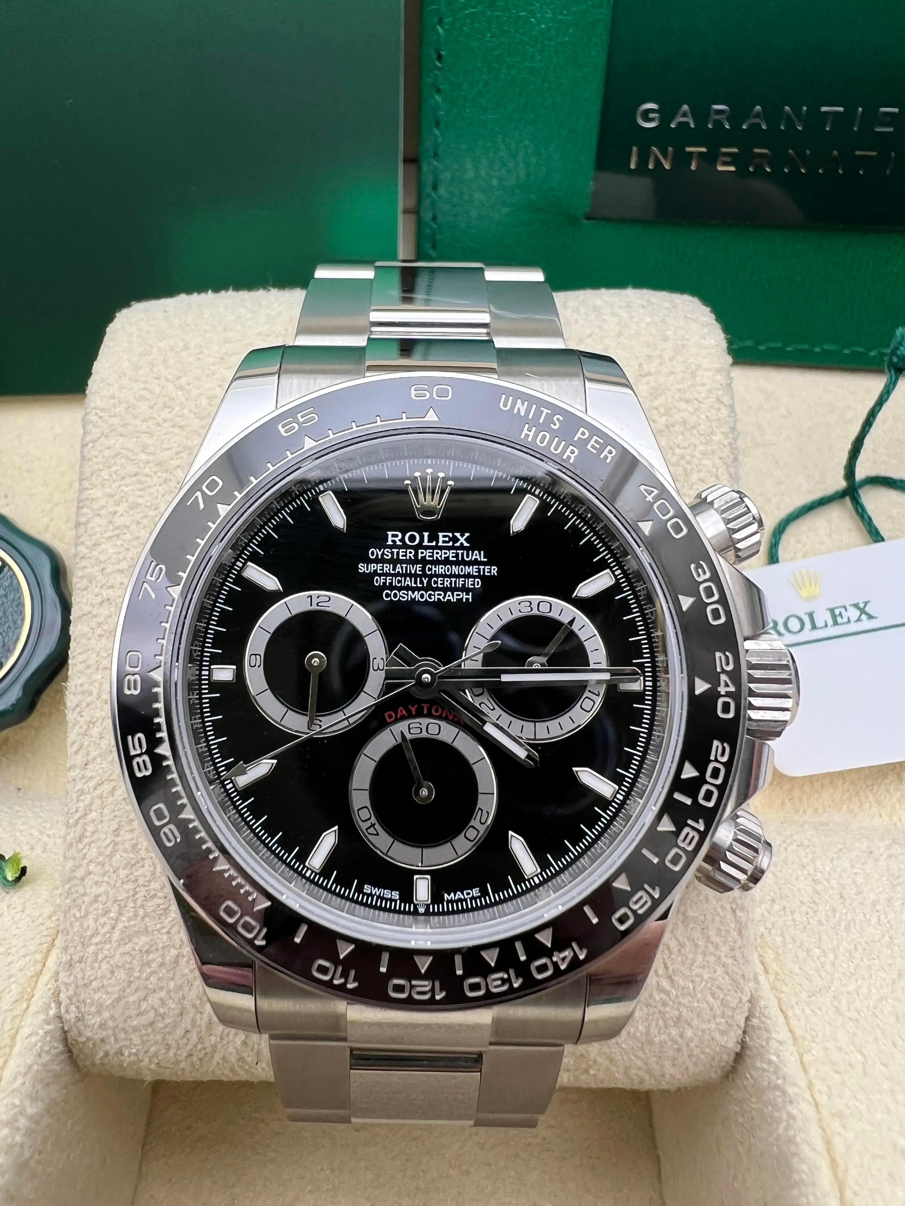 Pristine 2024 Rolex Daytona 40mm 126500LN Black Dial Oyster Bracelet Box Papers In Excellent Condition For Sale In New York, NY
