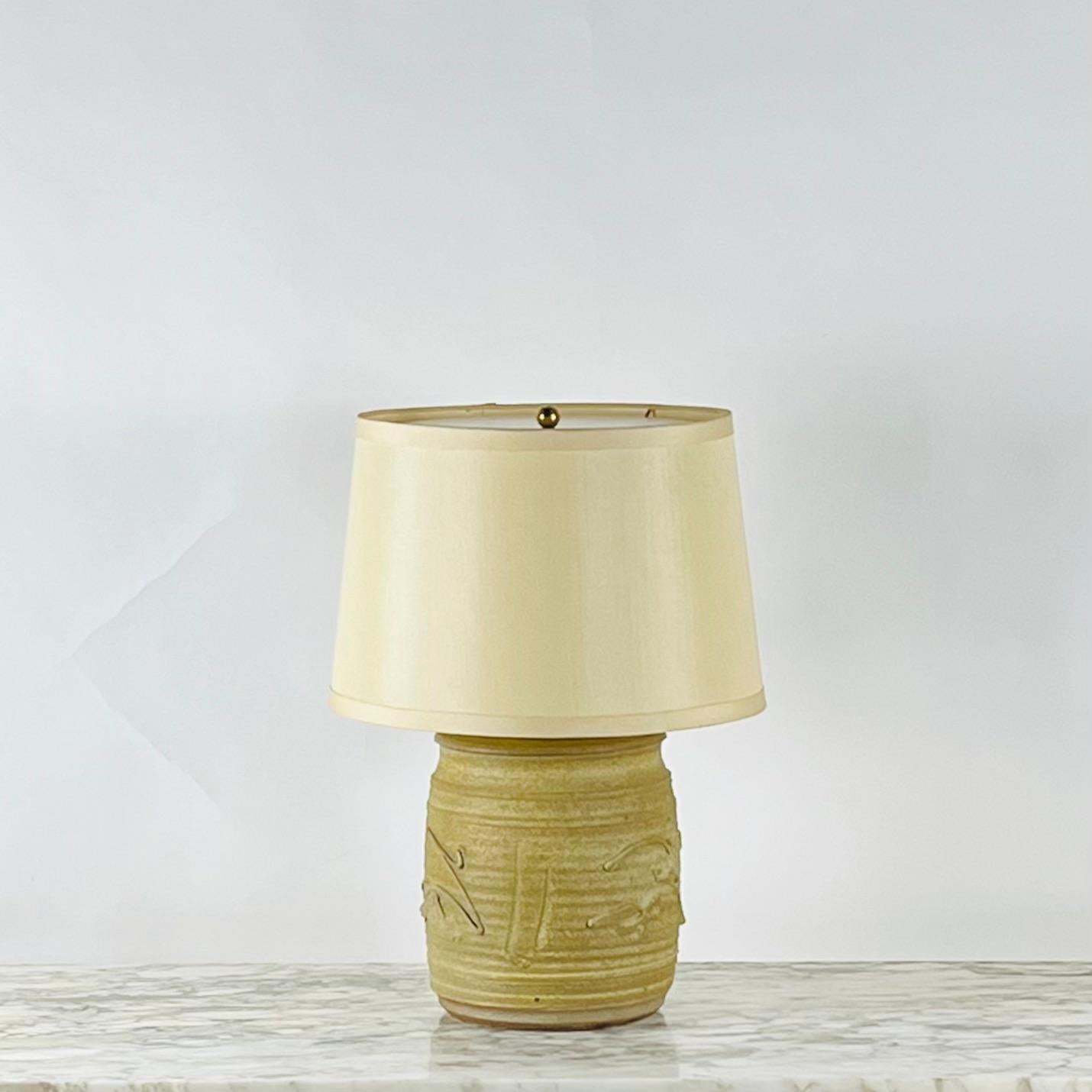 Pristine Affiliated Craftsmen studio pottery lamp with custom silk shade by Bob Kinzie & Phil Barkdall.

Impressed round Affiliated Craftsmen stamp at the base.

Dimensions listed are the overall dimensions of the base with the shade. Base size: 8.5