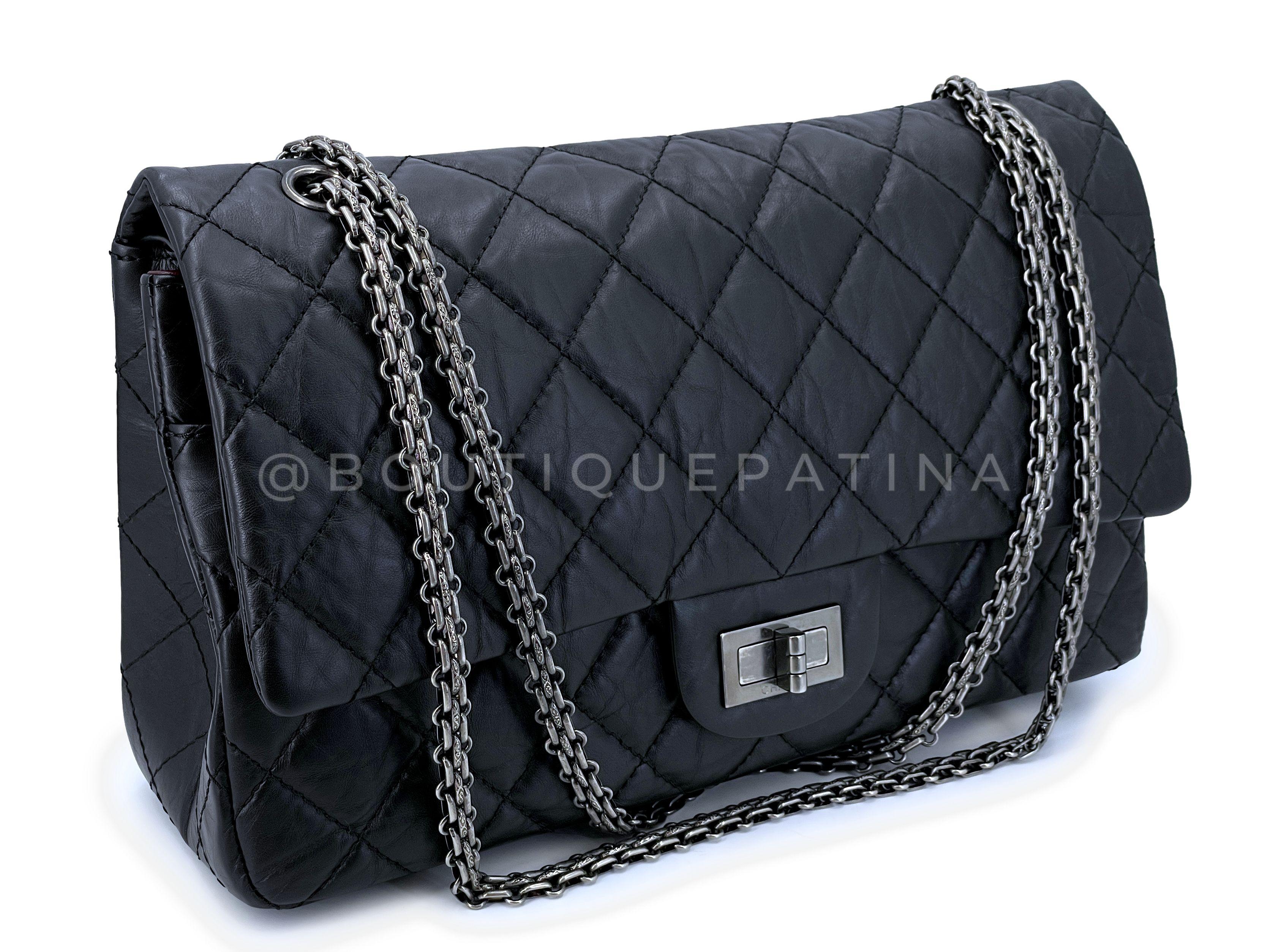 Store item: 66176
From 2011, an era of superior craftsmanship, our Pristine Chanel Black Aged Calfskin Reissue Large 227 2.55 Flap Bag RHW  is offered in pristine condition with a matte hand and clean, crisp edges, free of lower front/back creasing