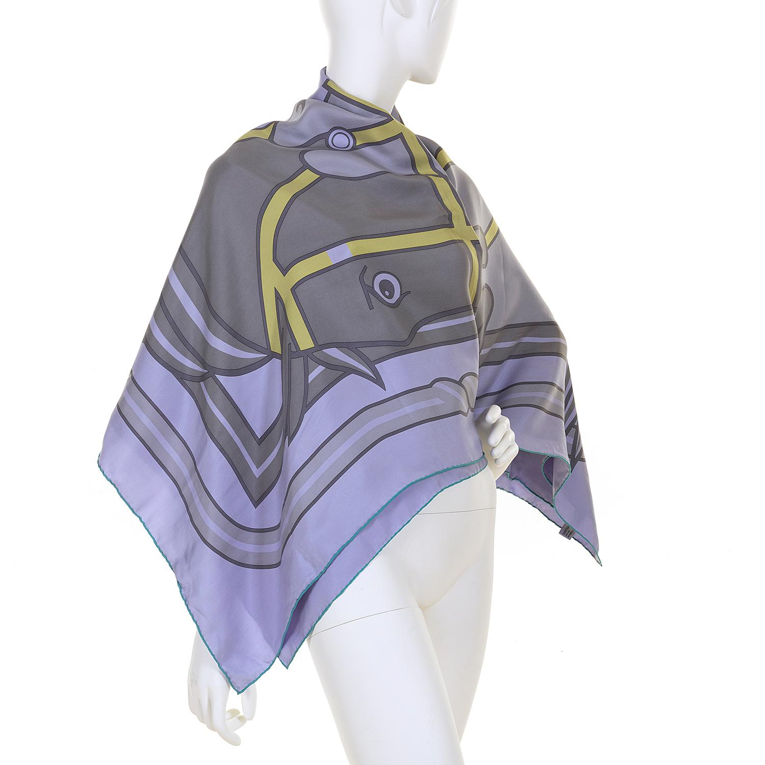 In beautiful colour ways of Lilac, Grey & Chartreuse, this very rare Hermes 140cm (55in. x 55in.) equine themed, Silk Shawl, 'Quadridge' is in pristine, 'Store-Fresh' condition. From a private collection in Paris, France, the Shawl still retains