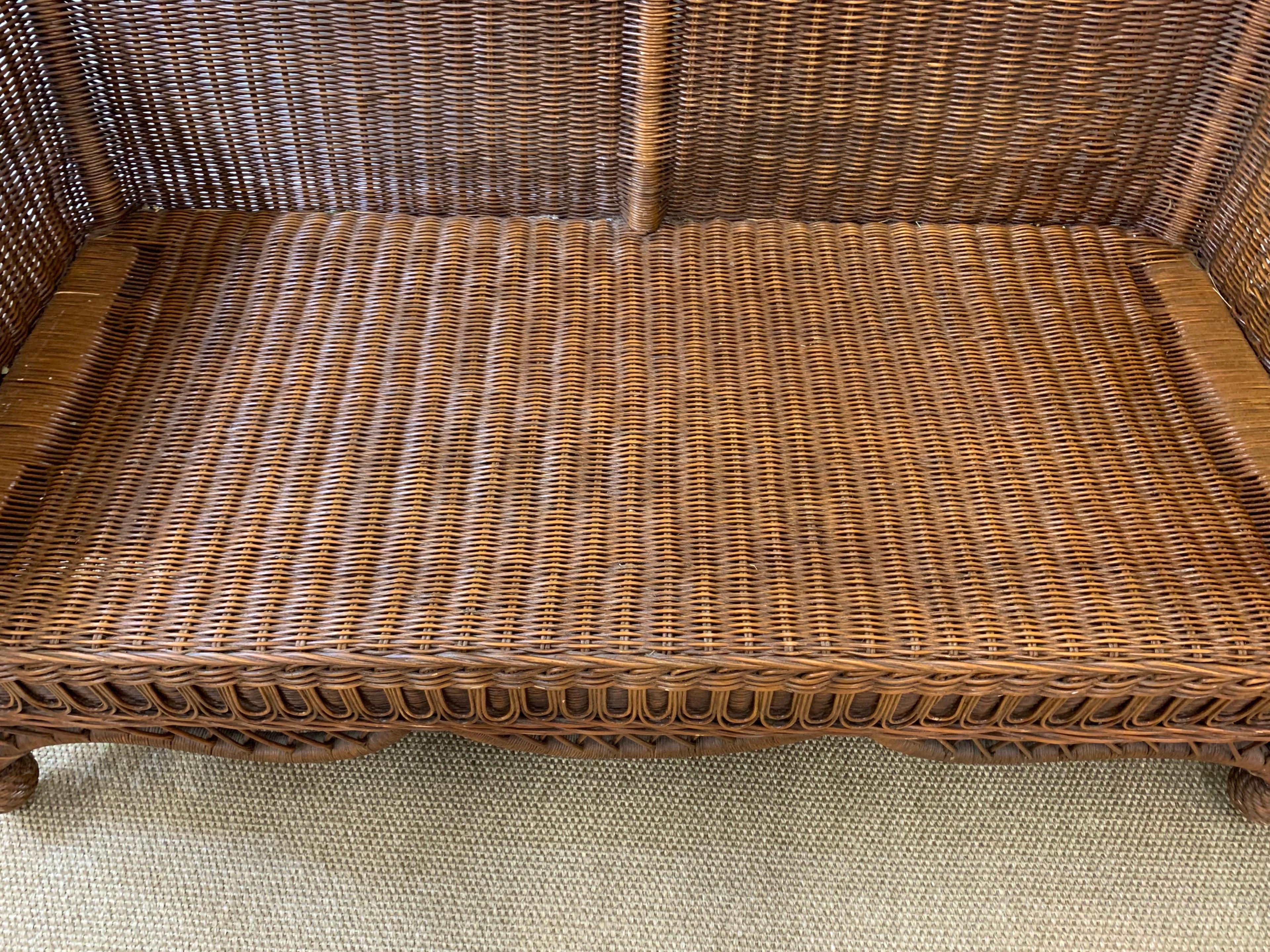Pristine Wicker Loveseat with Blue and White Upholstered Cushions 3