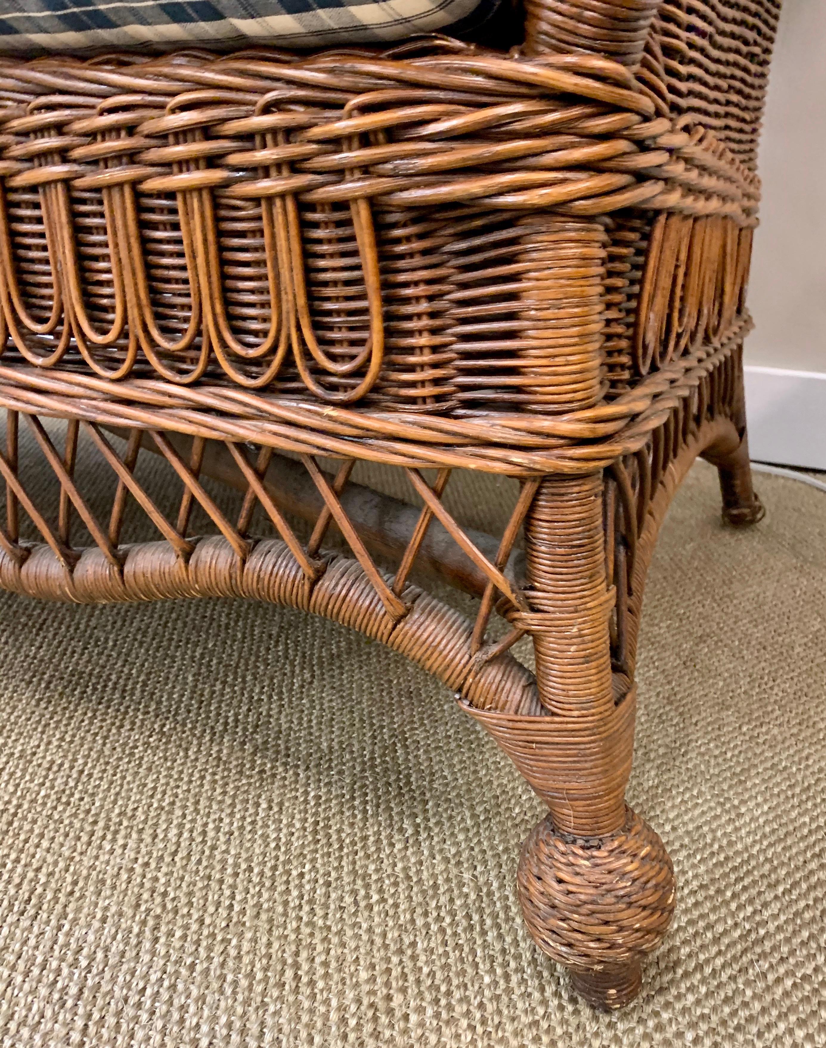 Pristine Wicker Loveseat with Blue and White Upholstered Cushions In Good Condition In West Hartford, CT