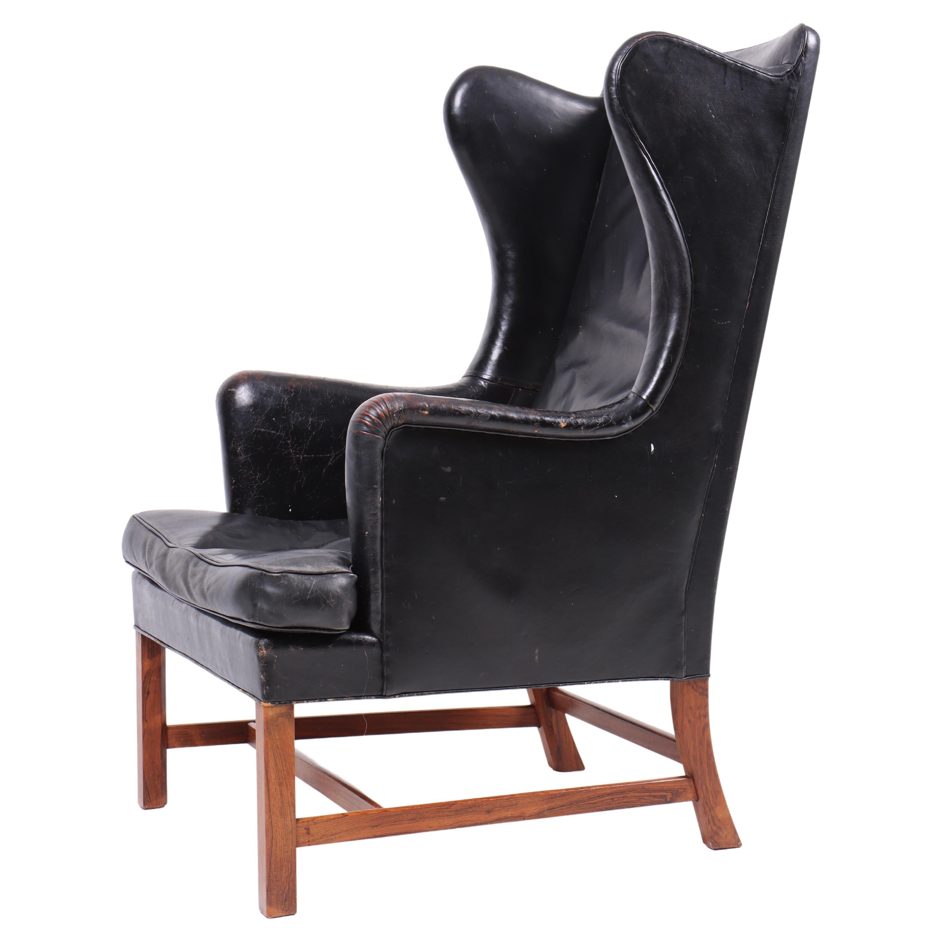 Pristine Wingback Chair in Patinated Leather by Kaare Klint, 1940s For Sale
